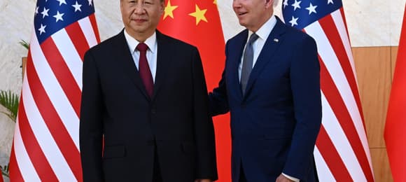 US President Joe Biden (R) and China's President Xi Jinping (L) meet on the sidelines of the G20 Summit in Nusa Dua on the Indonesian resort island of Bali on November 14, 2022. (Photo by SAUL LOEB / AFP)