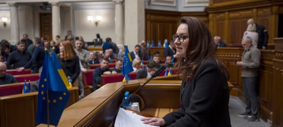Ukraine's Economy Minister and First Deputy Prime Minister Yulia Svyrydenko (C) delivers her speech before a vote to ratify a landmark minerals deal signed with the United States during a Parliament session in Kyiv on May 8, 2025, amid the Russian invasion of Ukraine. Ukrainian lawmakers voted May 8, 2025, to ratify resources deal with the United States that Kyiv hopes will pave the way for future military support from Washington, a top minister said.