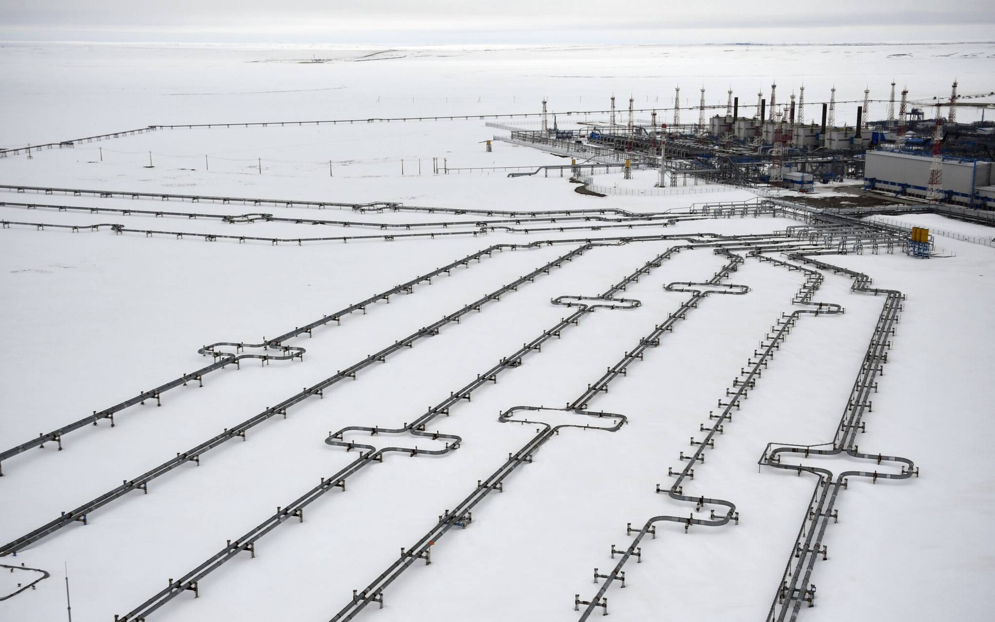 Incoming pipelines leading to the Bovanenkovo gas field on the Yamal peninsula in the Arctic circle on May 21, 2019. (Photo by Alexander NEMENOV / AFP)
