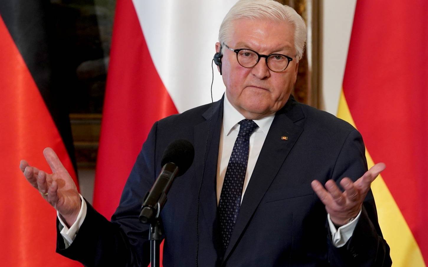 German President Frank-Walter Steinmeier attends a press briefing with the Polish President after their meeting in Warsaw on April 12, 2022. (Photo by JANEK SKARZYNSKI / AFP)