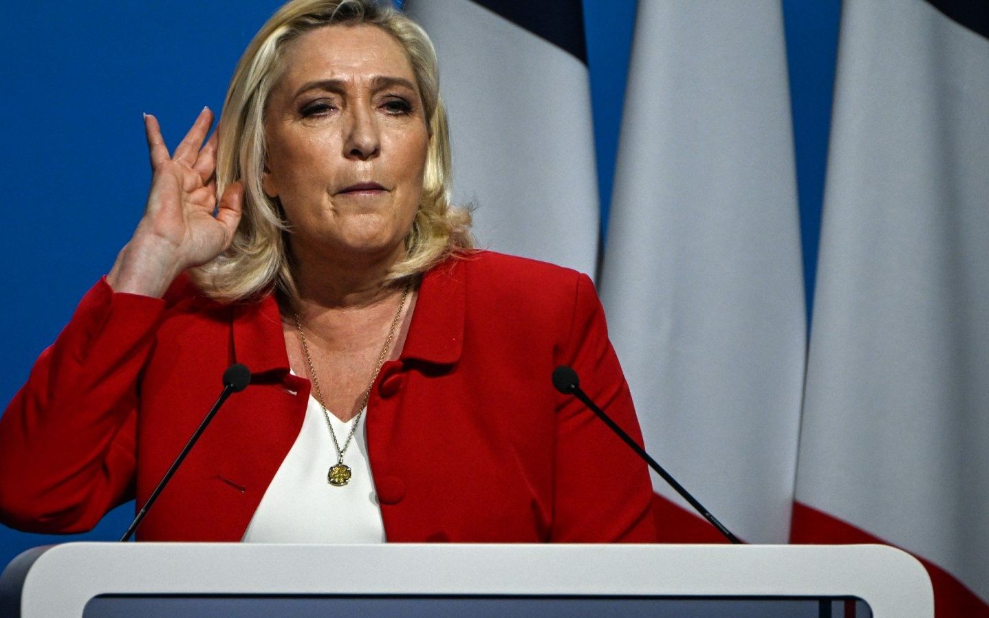 French far-right party Rassemblement National (RN) presidential candidate Marine Le Pen delivers a speech at a gathering with supporters as part of a campaign visit in Avignon on April 14, 2022. (Photo by CHRISTOPHE SIMON / AFP)