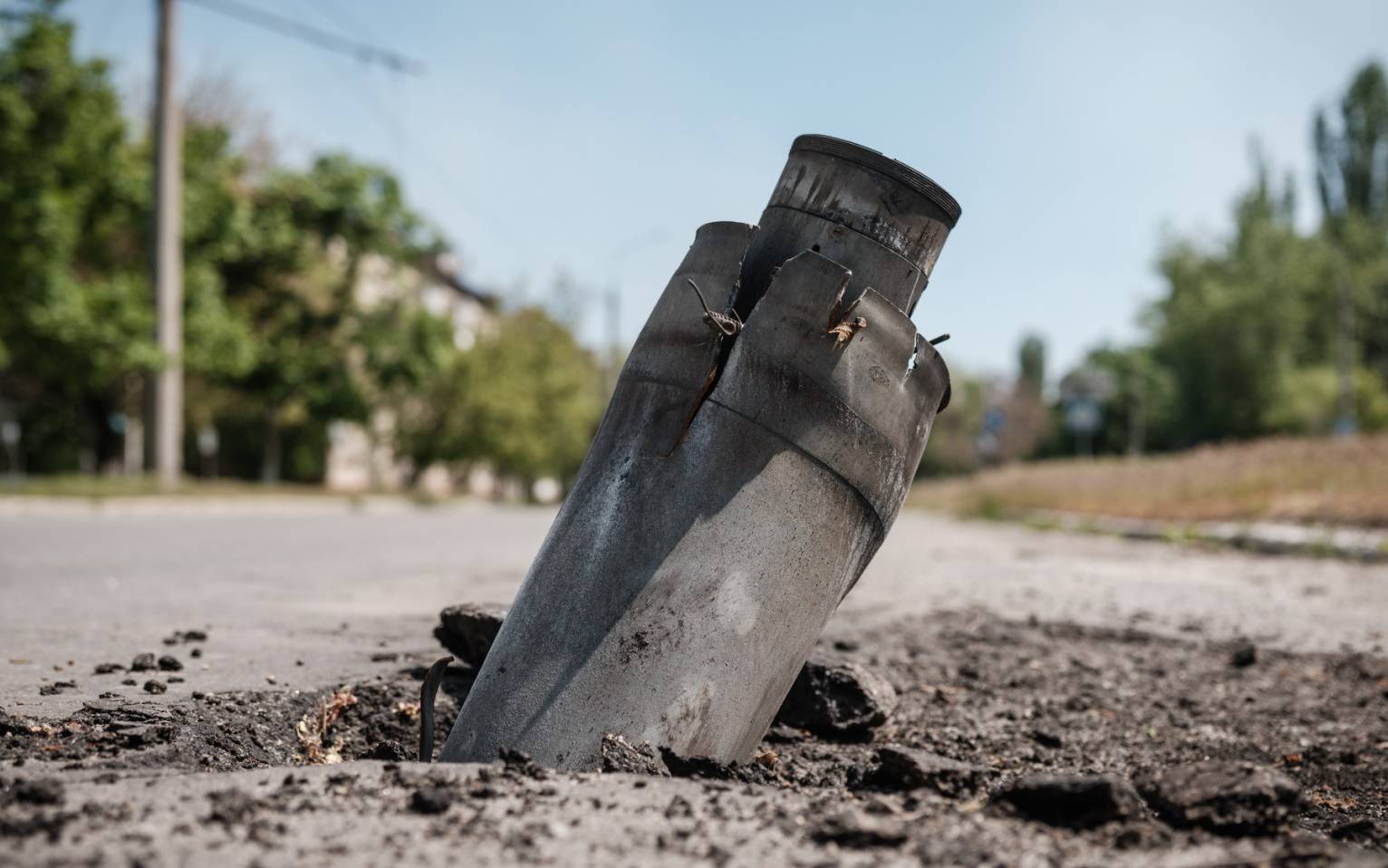 An Unexploded Ordnance (UXO) is pictured on a road in Severodonetsk, eastern Ukraine, on May 7, 2022, amid the Russian invasion of Ukraine. (Photo by Yasuyoshi CHIBA / AFP)