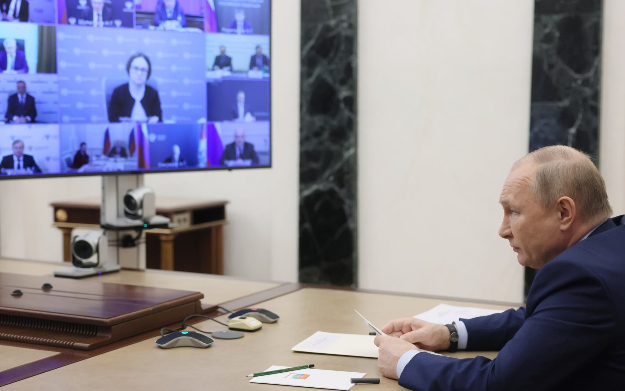 Russian President Vladimir Putin chairs a meeting on the development of the oil industry via a video link in Moscow on May 17, 2022. (Photo by Mikhail METZEL / SPUTNIK / AFP)