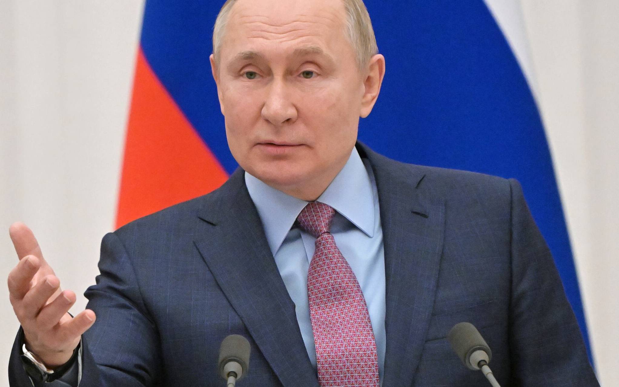 Russia's President Vladimir Putin gestures as he speaks during a press conference with his Belarus counterpart, following their talks at the Kremlin in Moscow on February 18, 2022. - Vladimir Putin said on February 18, 2022 that the situation in conflict-hit eastern Ukraine was worsening, as the West accuses him of planning an imminent attack on the country. (Photo by Sergei GUNEYEV / Sputnik / AFP)
