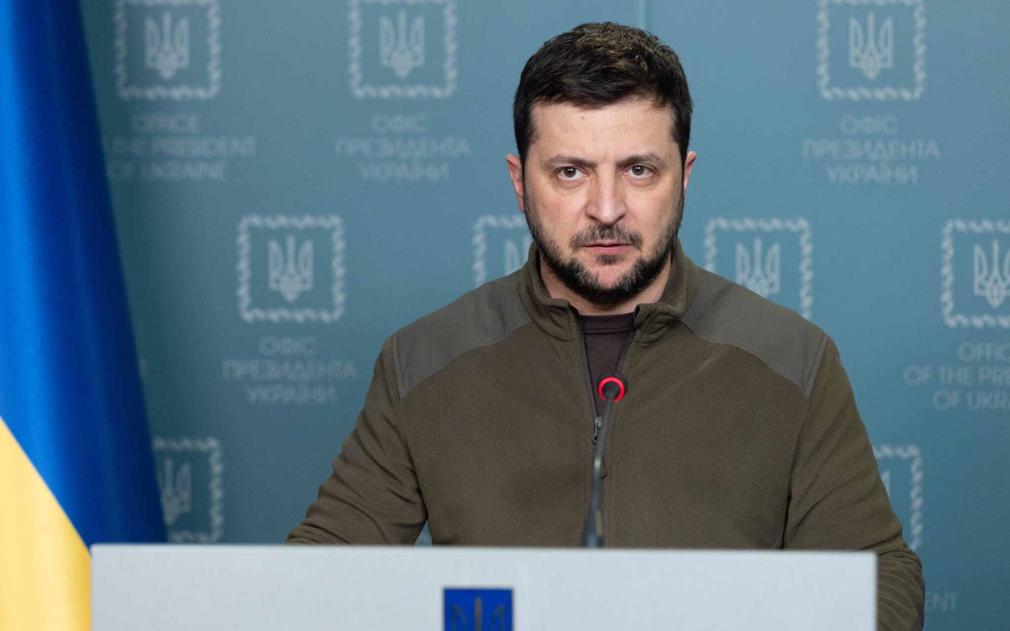 In this handout picture taken and released by the Ukrainian Presidency Press Office on March 18, 2022, Ukrainian President Volodymyr Zelensky addresses the nation in Kyiv. - Ukraine's President Volodymyr Zelensky said on March 18, 130 people had been saved after the bombing of a theatre in the port city of Mariupol under Russian siege, but "hundreds" were still trapped in rubble. (Photo by Handout / UKRAINE PRESIDENCY / AFP)
