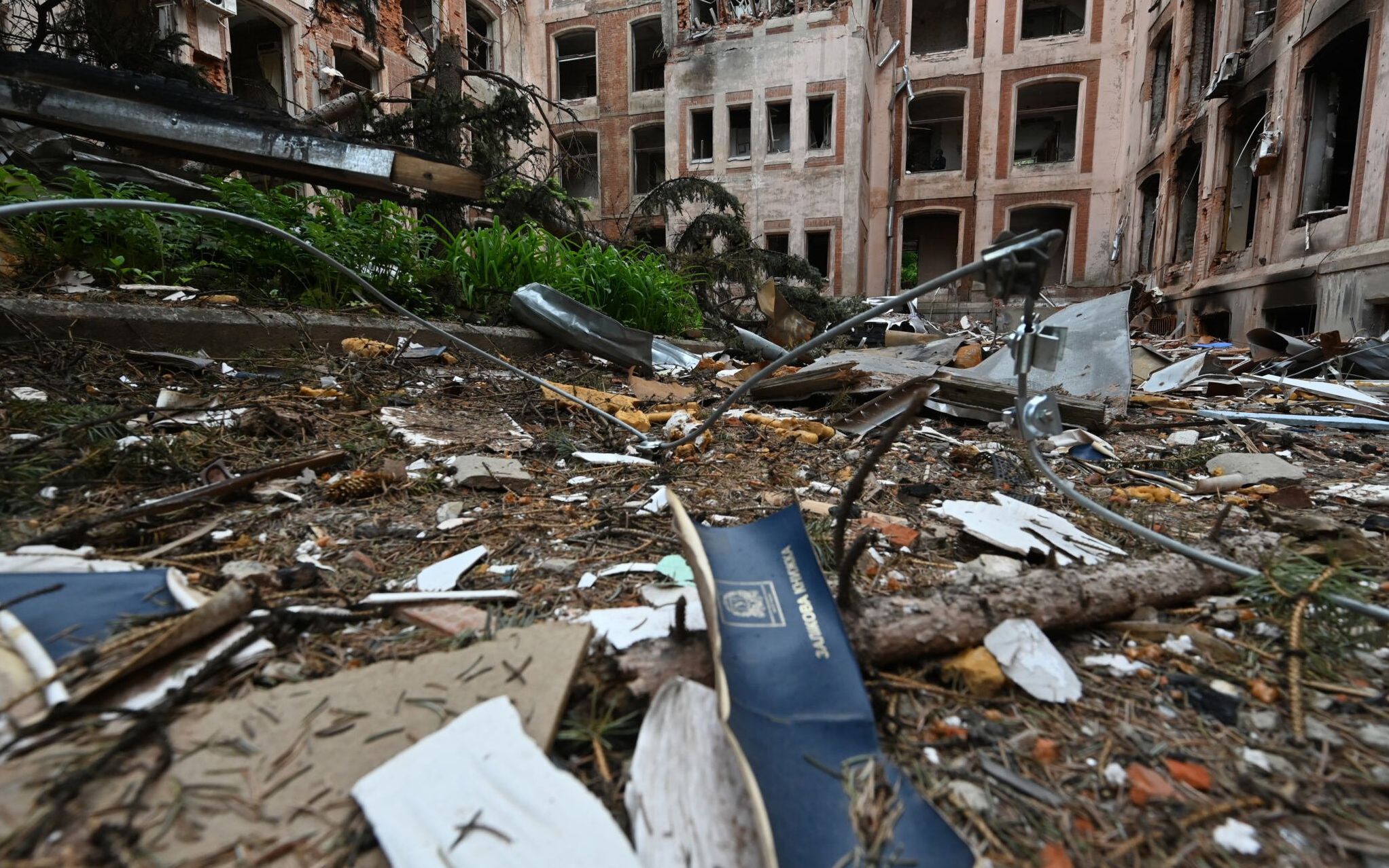 This photograph taken on May 28, 2022, shows the damaged building of the Faculty of Economics of Karazin National University in Kharkiv, amid Russian invasion of Ukraine. - Shells and missiles have been falling on cities since the start of the war in Ukraine, damaging historic buildings. Cultural services try to preserve their memory and record the damages with advanced laser technology and 3D scans. (Photo by Genya SAVILOV / AFP)