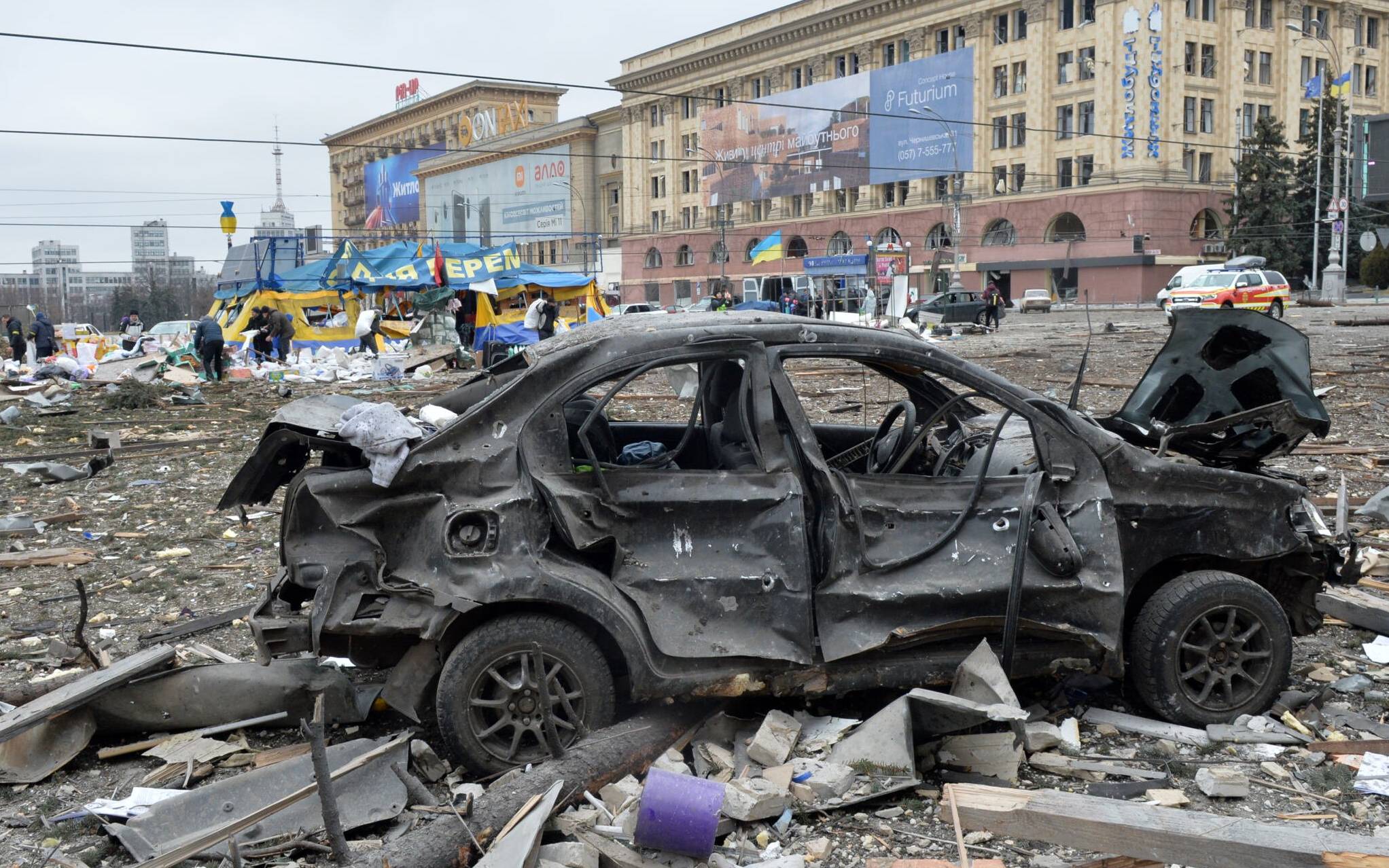 A view of the square outside the damaged local city hall of Kharkiv on March 1, 2022, destroyed as a result of Russian troop shelling. - The central square of Ukraine's second city, Kharkiv, was shelled by advancing Russian forces who hit the building of the local administration, regional governor Oleg Sinegubov said. Kharkiv, a largely Russian-speaking city near the Russian border, has a population of around 1.4 million. (Photo by Sergey BOBOK / AFP)