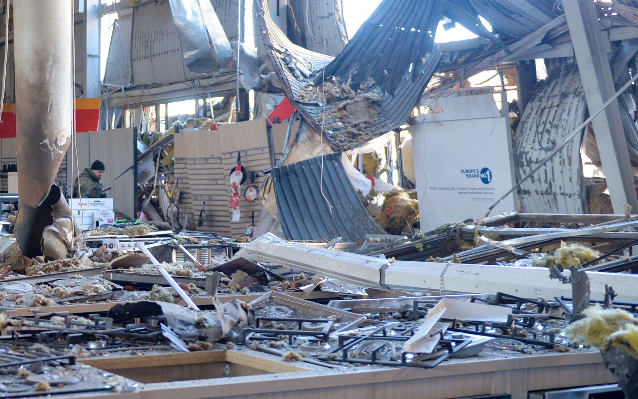 A view of a household appliances and electronics supermarket destroyed by recent shelling in Kharkiv on March 15, 2022, amid the ongoing Russia's invasion of Ukraine. (Photo by Sergey BOBOK / AFP)