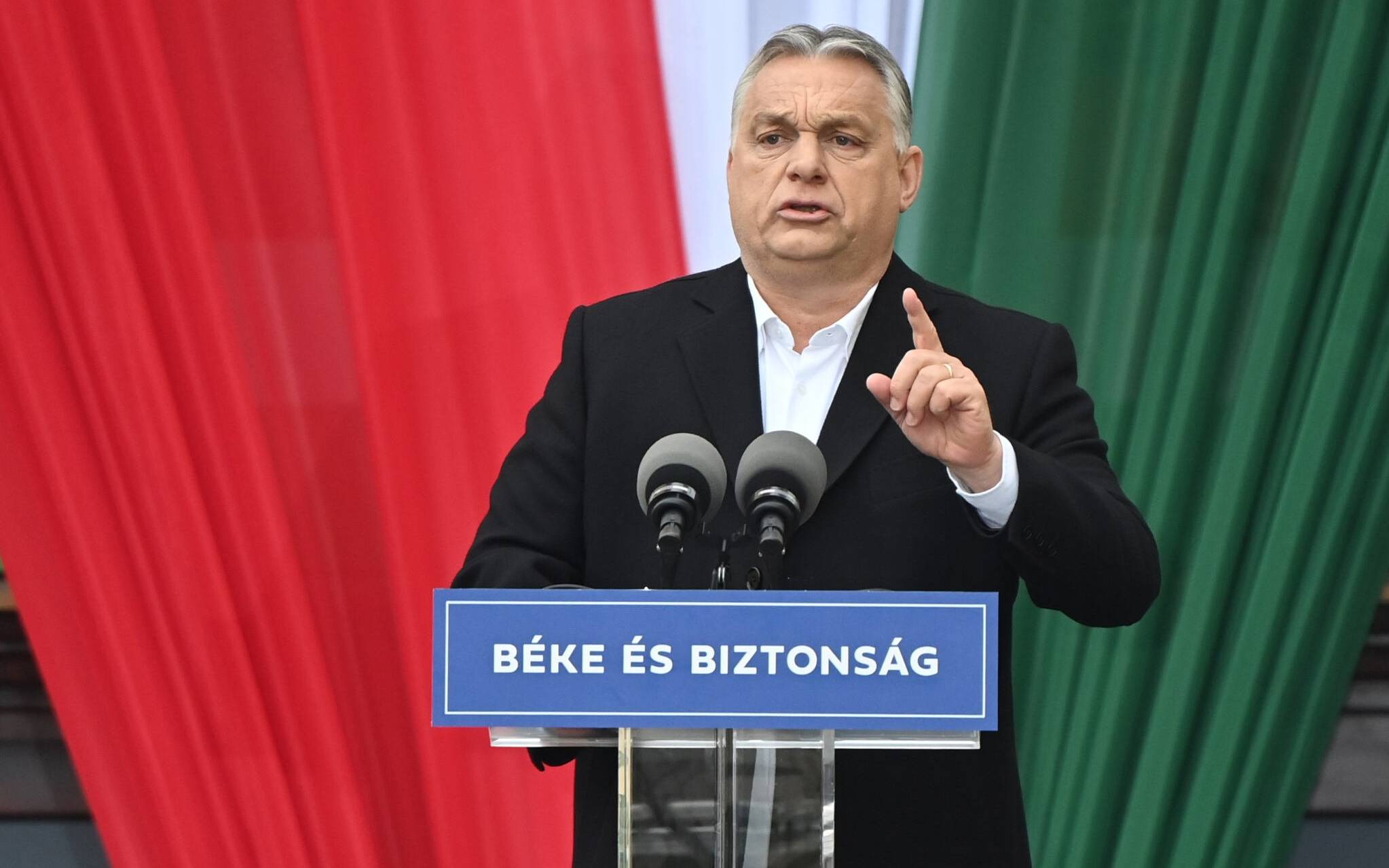 Hungarian Prime Minister Viktor Orban speaks on stage during the closing campaign session of the FIDESZ party, in Szekesfehervar, Hungary on April 1, 2022. - Hungary's Prime Minister Viktor Orban, who is standing for a fourth term on April 3, 2022, has alarmed critics at home and abroad with crackdowns on civil liberties and fierce rhetoric. (Photo by Attila KISBENEDEK / AFP)
