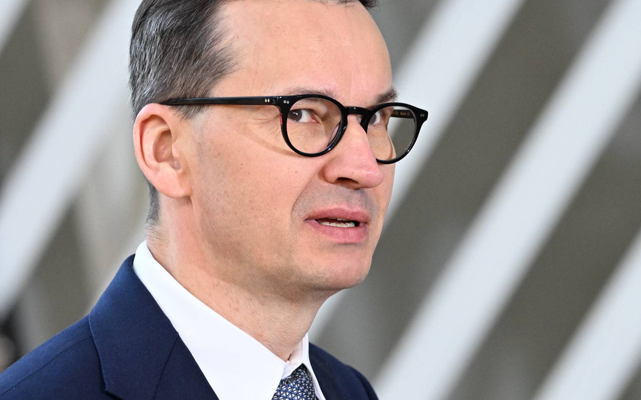 Poland's Prime Minister Mateusz Morawiecki arrives ahead of EU leaders extraordinary meeting to discuss Ukraine, defence and energy in Brussels, on May 31, 2022. (Photo by Emmanuel DUNAND / AFP)