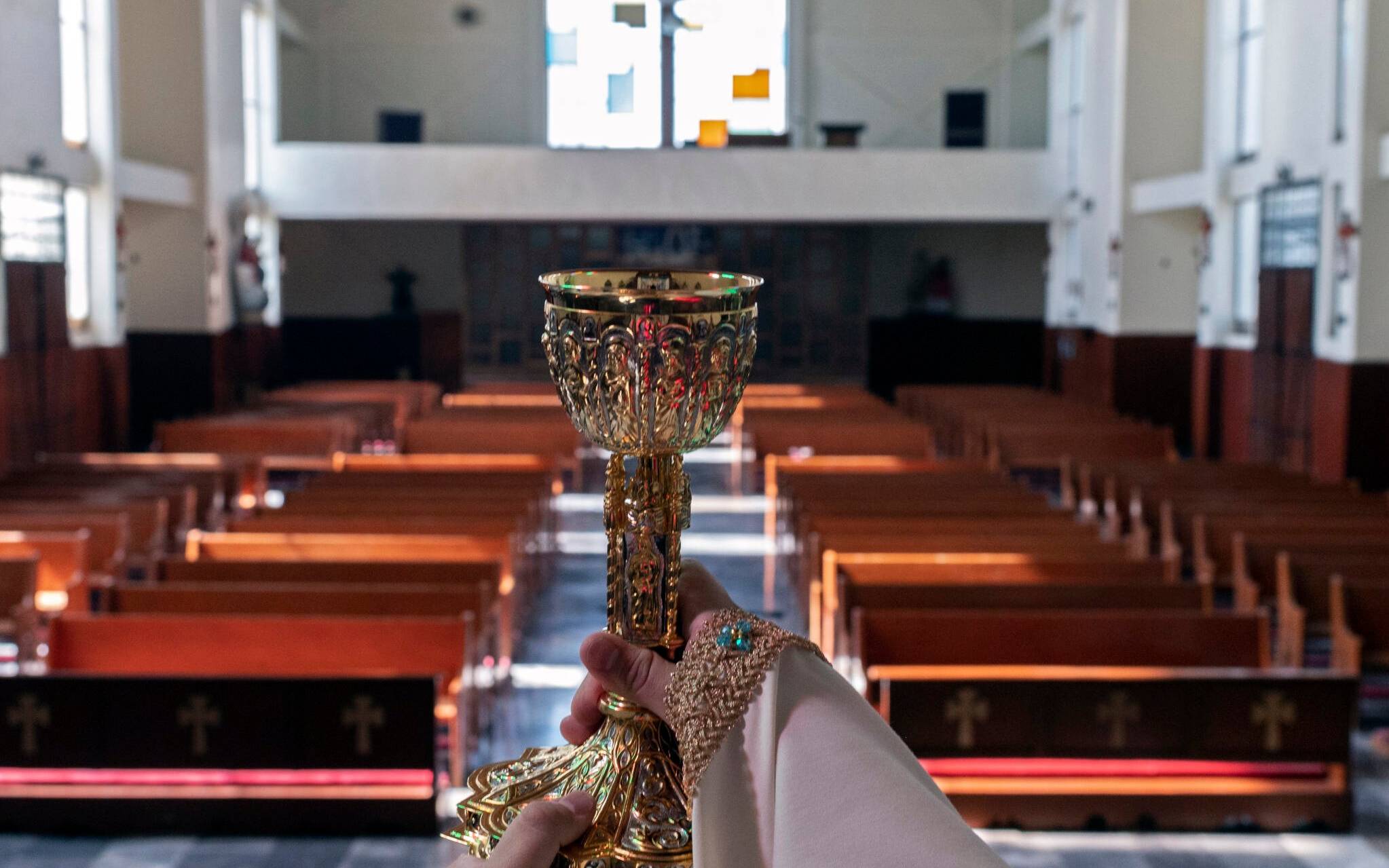Catholic priest Arturo Correa celebrates Easter Mass amid the Coronavirus pandemic in the near-empty parish of Our Lady of Guadalupe, in Tlalnepantla, Mexico State, on April 12, 2020.