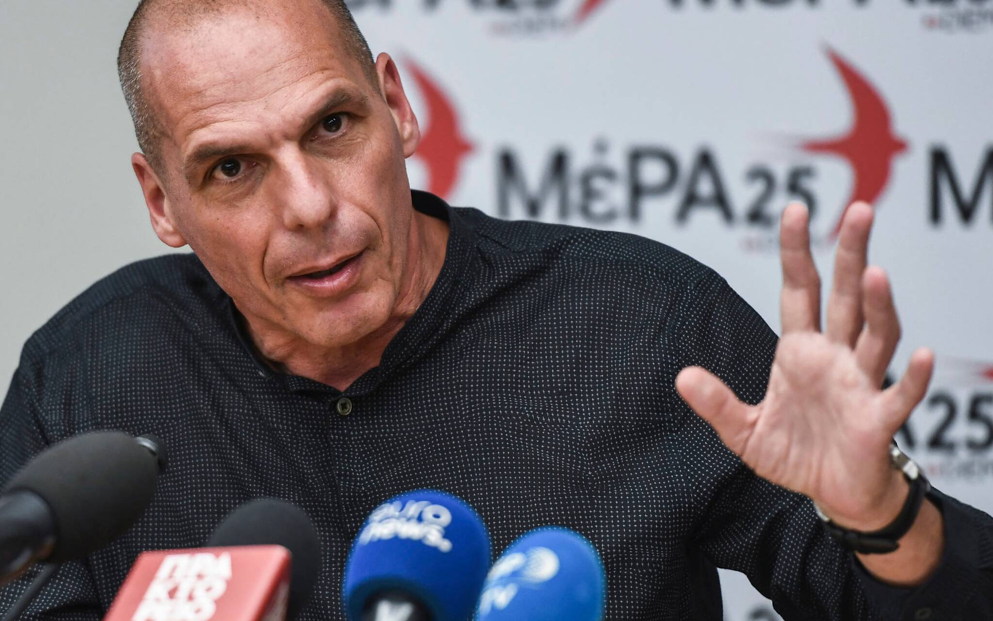 Yanis Varoufakis, leader of the anti-establishment European Realistic Disobedience Front (MeRA25) movement, DiEM25's electoral wing in Greece, gestures as he speaks during a press conferense following the results of last week end's European parliamentary elections on May 29, 2019 in Athens. - Varoufakis' party missed out a European Parliament seat in the European elections on May 26, and will now participate in Greek general elections that will be held on July 7. (Photo by Aris MESSINIS / AFP)