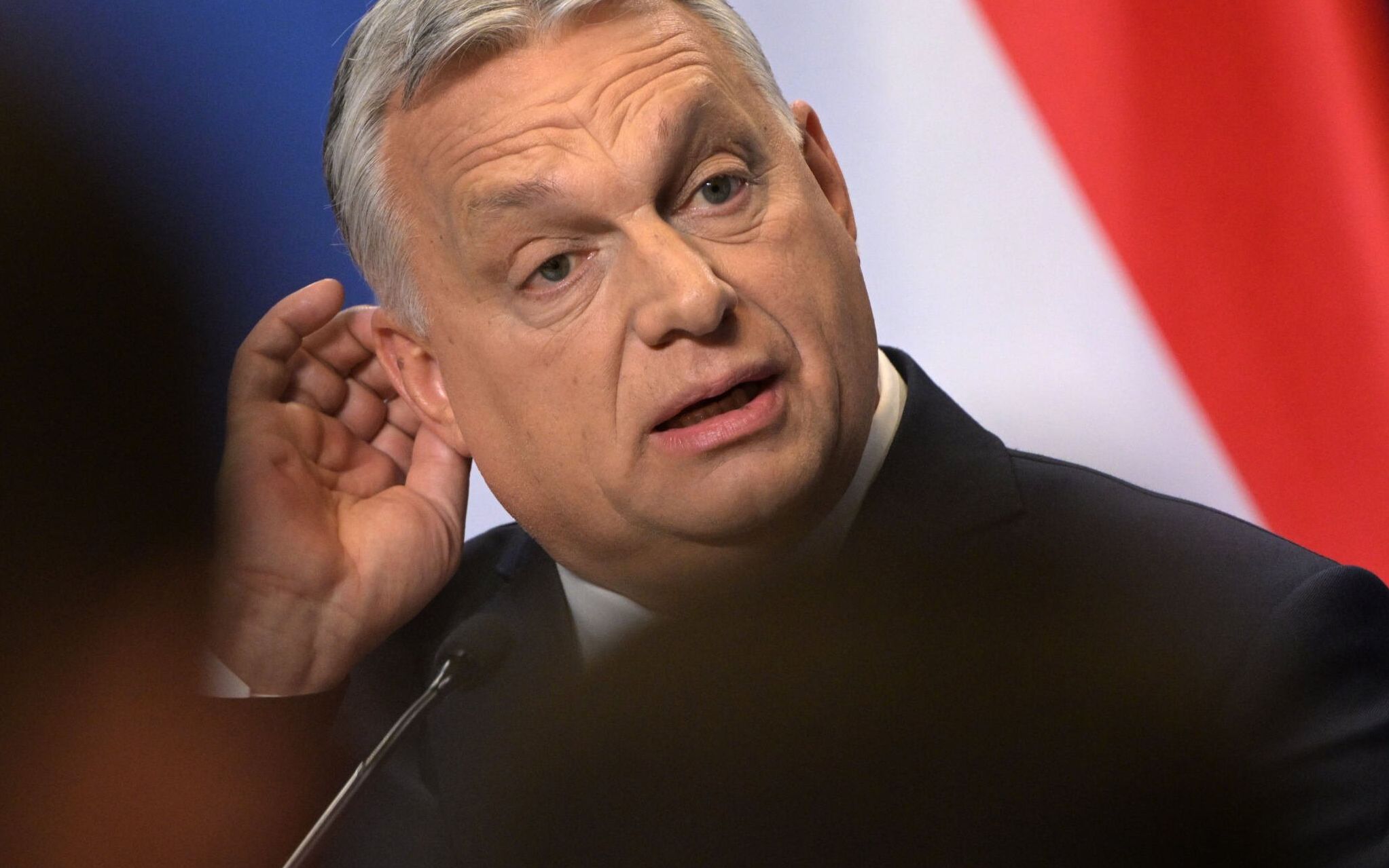 Hungarian Prime Minister Viktor Orban gives his first international press conference after his FIDESZ party won the parliamentary election, in the Karmelita monastery housing the prime minister's office in Budapest on April 6, 2022. - A patriot to his supporters but an autocrat to his critics, Hungary's all-powerful premier Viktor Orban looks set to continue his transformative "illiberal" revolution after his Fidesz party won a fourth straight term in office on Sunday, April 3, 2022. (Photo by Attila KISBENEDEK / AFP)
