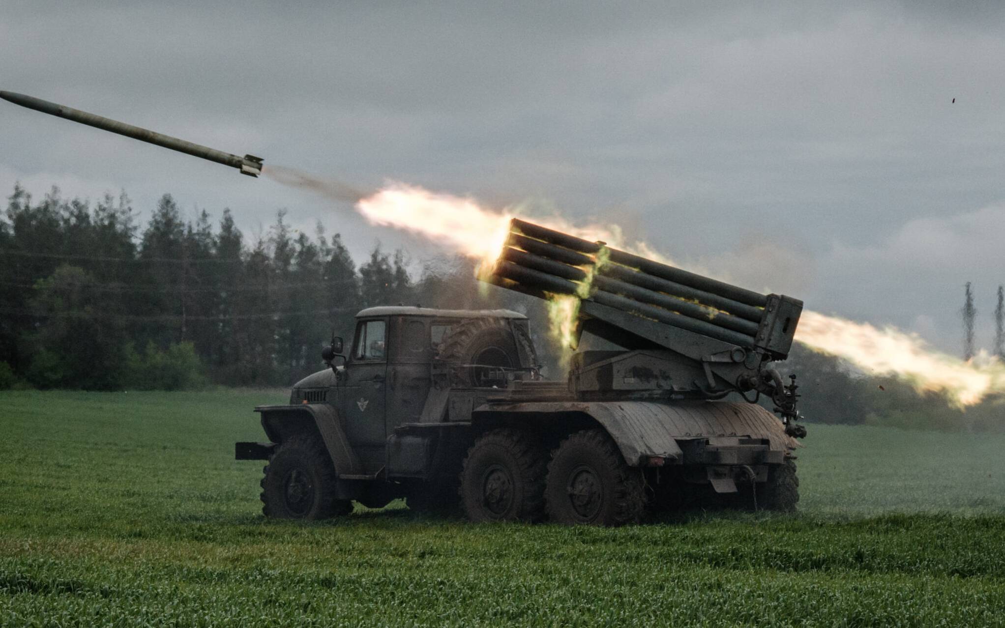 A rocket is launched from a truck-mounted multiple rocket launcher near Svyatohirsk, eastern Ukraine, on May 14, 2022, amid the Russian invasion of Ukraine. (Photo by Yasuyoshi CHIBA / AFP)