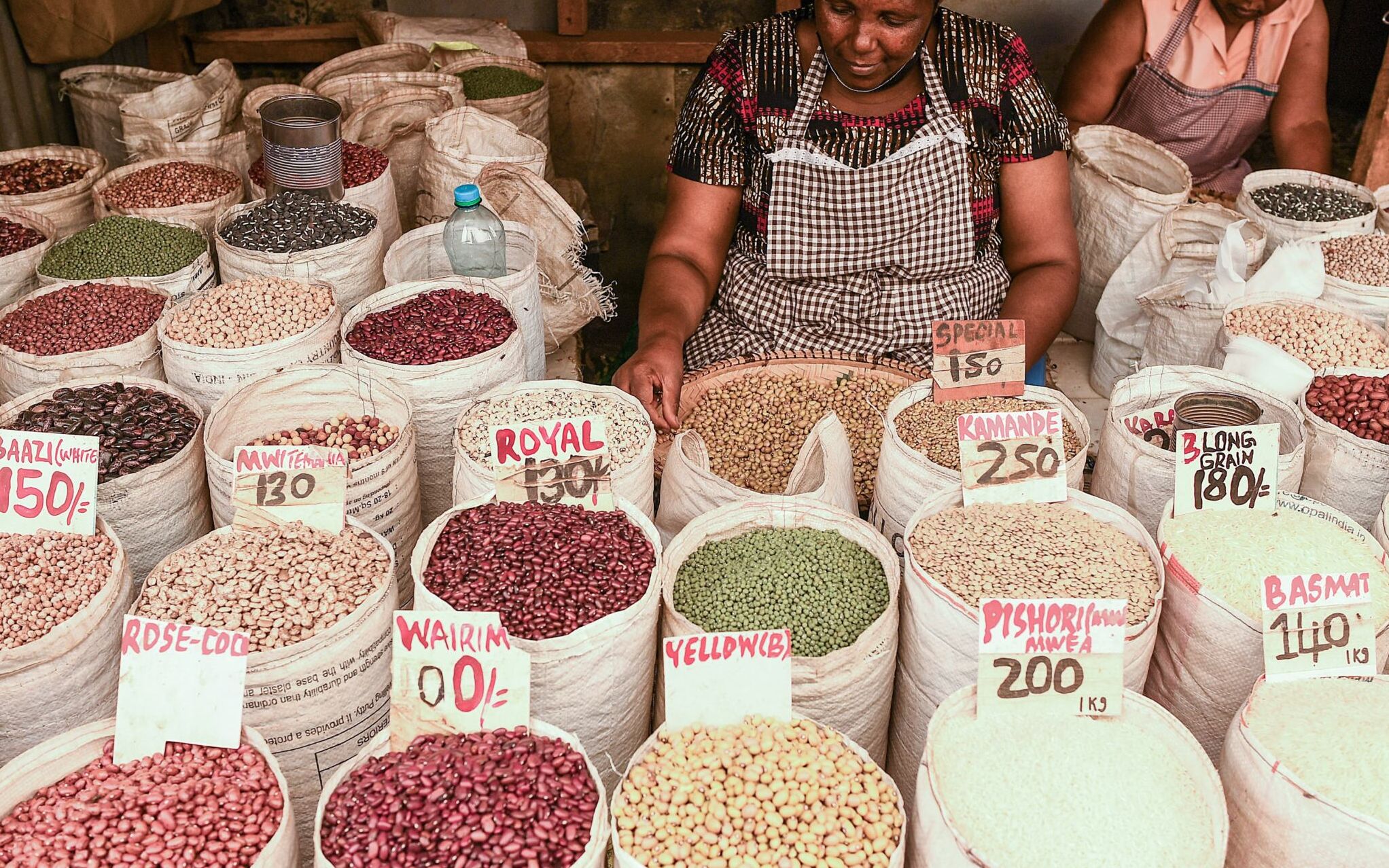 A vendor sells cereals in Nairobi on March 16, 2022. - African countries are feeling the pain of Ukraine's crisis as supply disruptions hike inflation and oil prices push up fuel costs.
Global oil prices touched ten-year highs of more than $100 a barrel soon after Russia invaded Ukraine, doubling diesel prices for African countries like Nigeria.
Ukraine and Russia are both major suppliers of wheat and grains to Africa and Western sanctions and disruptions are already hiking costs across the continent. (Photo by Simon MAINA / AFP)