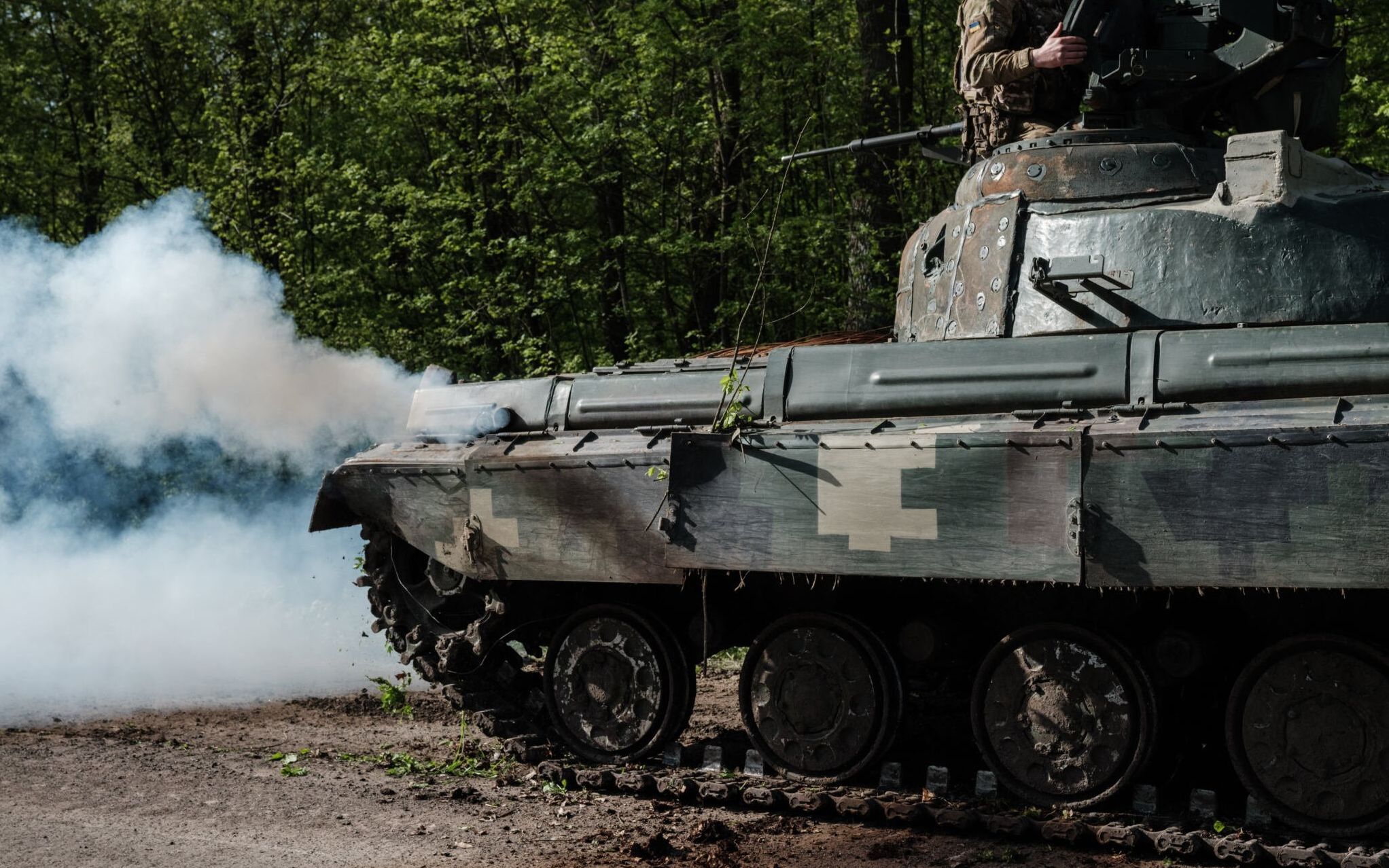 A Ukrainian soldier sits on a tank near Sloviansk, eastern Ukraine, on April 26, 2022, amid the Russian invasion of Ukraine. (Photo by Yasuyoshi CHIBA / AFP)