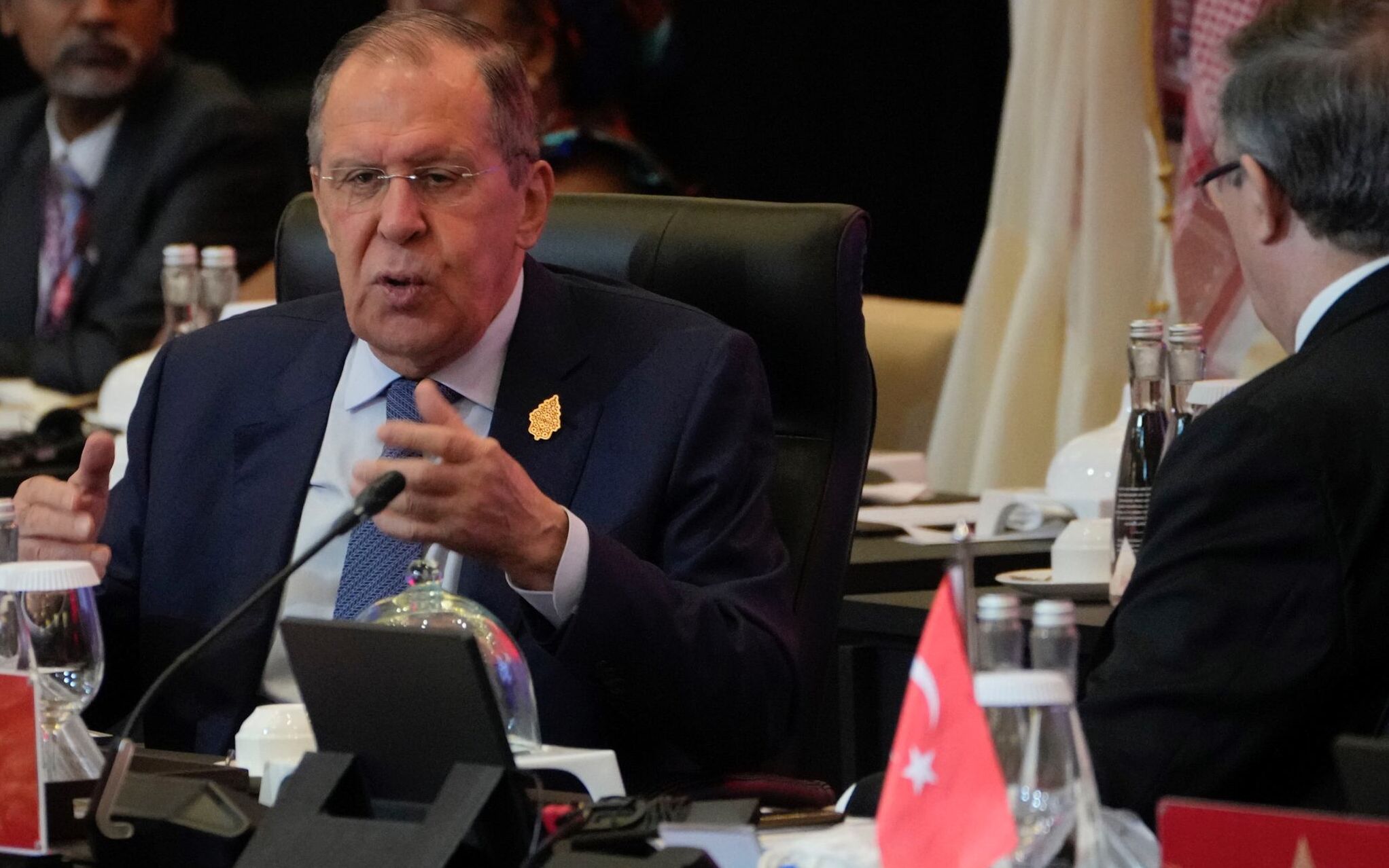 Russian Foreign Minister Sergei Lavrov (L) speaks with Mexican Foreign Affairs Secretary Marcelo Ebrard (R) during the G20 Foreign Ministers' Meeting in Nusa Dua on the Indonesian resort island of Bali on July 8, 2022. (Photo by DITA ALANGKARA / POOL / AFP)