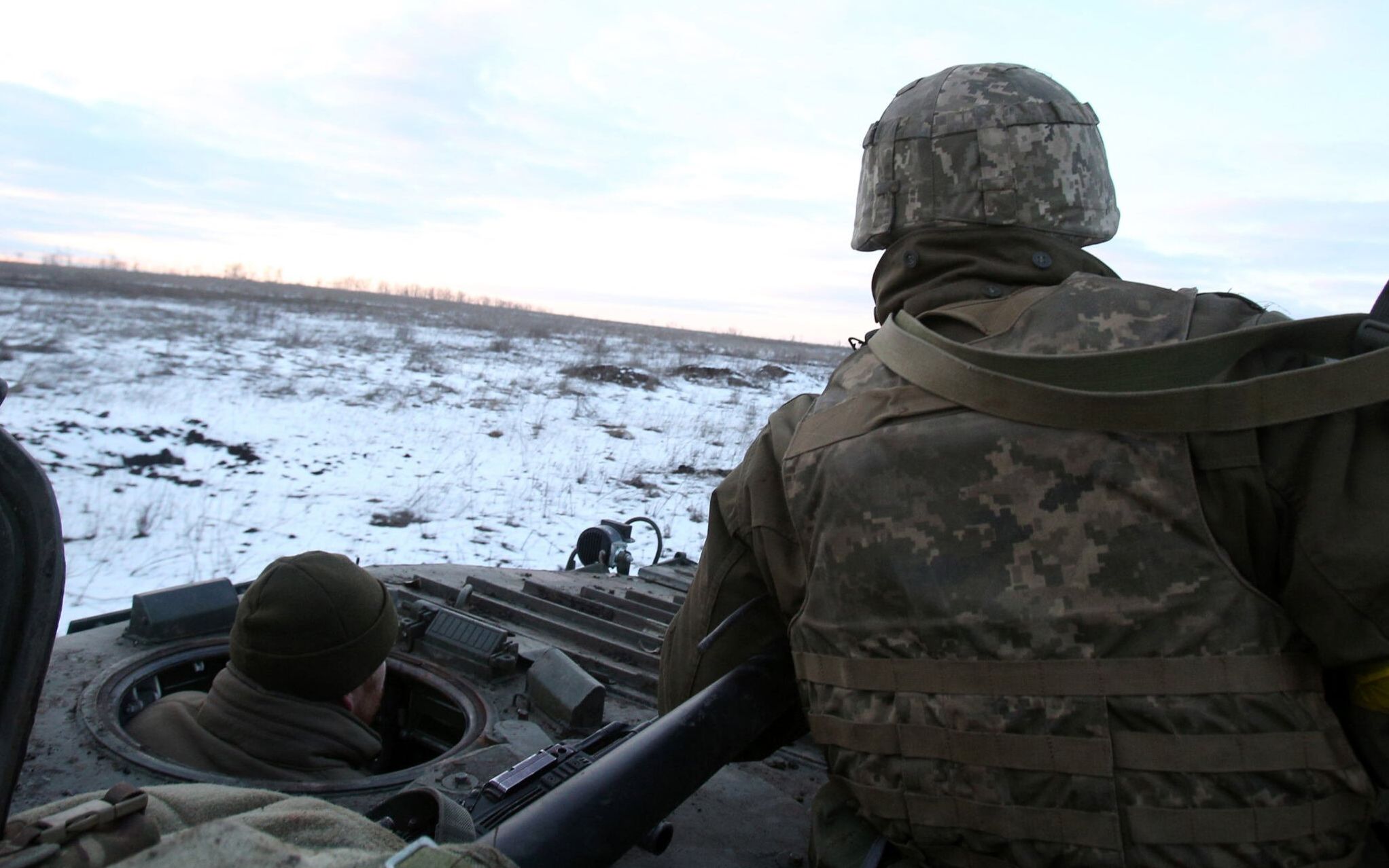 Servicemen of the Ukrainian Military Forces  sit in their armoured vehicle following fighting against Russian troops and Russia-backed separatists near Zolote village, Lugansk region on March 6, 2022. - Russia's invasion of Ukraine, now in its eleventh day, has seen more than 1.5 million people flee the country in what the UN has called "Europe's fastest growing refugee crisis since World War II". (Photo by Anatolii Stepanov / AFP)