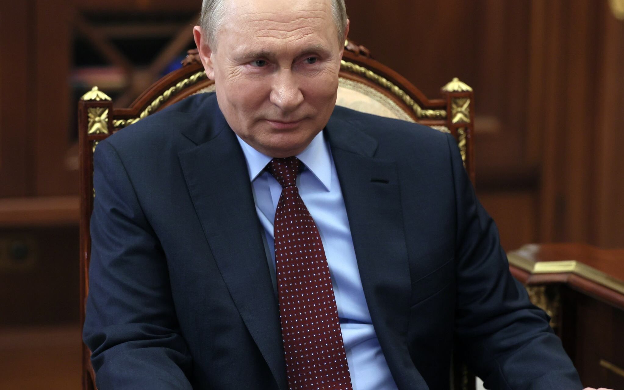 Russian President Vladimir Putin attends a meeting with the head of Russia's Union of Industrialists and Entrepreneurs, a big business lobby group, at the Kremlin in Moscow on March 2, 2022. (Photo by Mikhail Klimentyev / SPUTNIK / AFP)