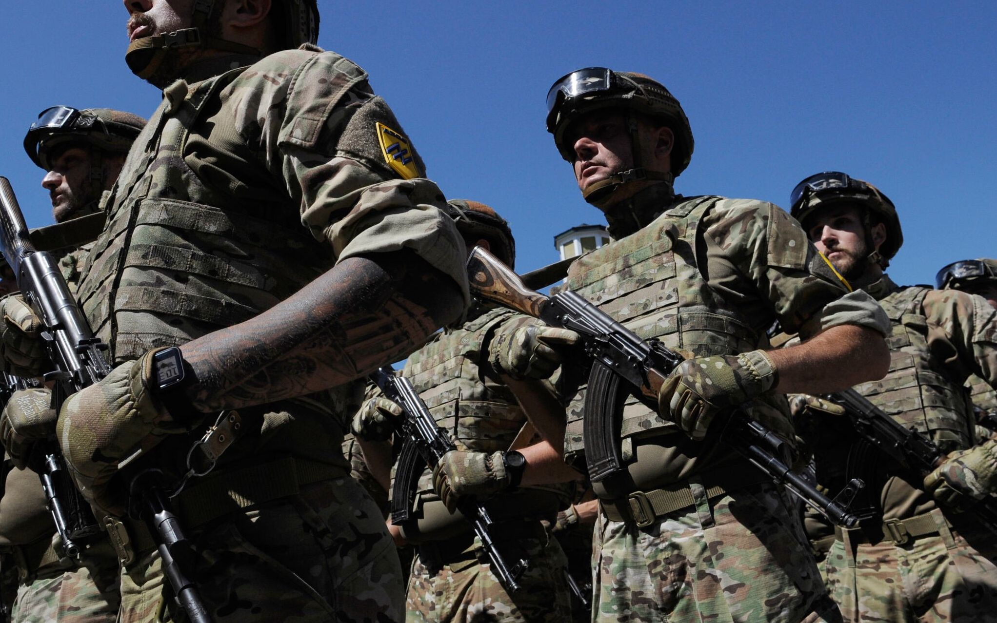 Servicemen of the "Azov" regiment take part in a parade to mark the 5th anniversary of city's liberation from the Russia-backed rebels, on June 15, 2019 in Mariupol. (Photo by Evgeniya MAKSYMOVA / AFP)
