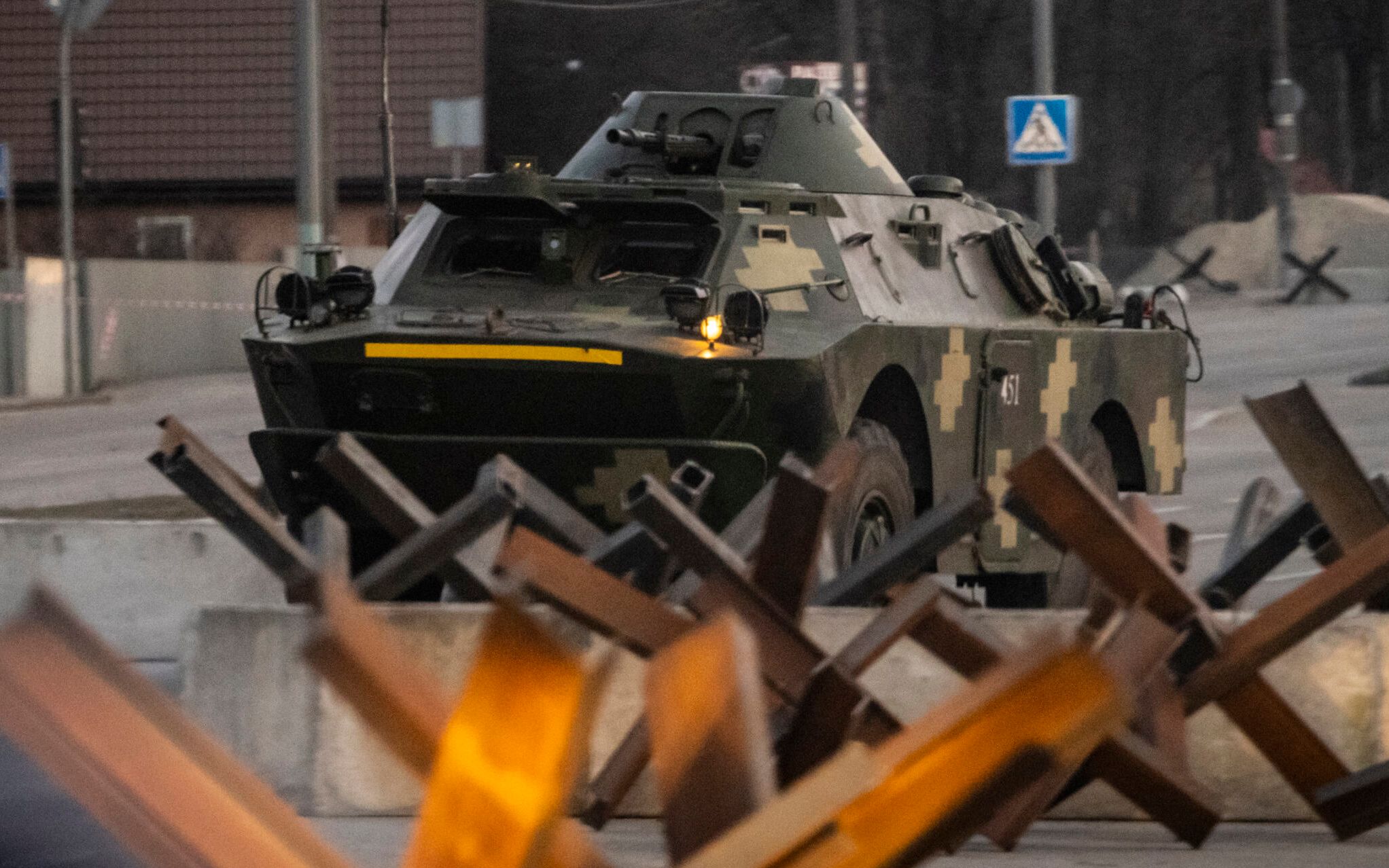 A Ukranian armoured vehicle drives along a road in the Ukranian capital Kyiv on March 19, 2022. - More than 3.3 million refugees have now fled Ukraine since the Russian invasion on February 24, 2022, while nearly 6.5 million are thought to be internally displaced within the country, the UN refugee agency says. (Photo by FADEL SENNA / AFP)