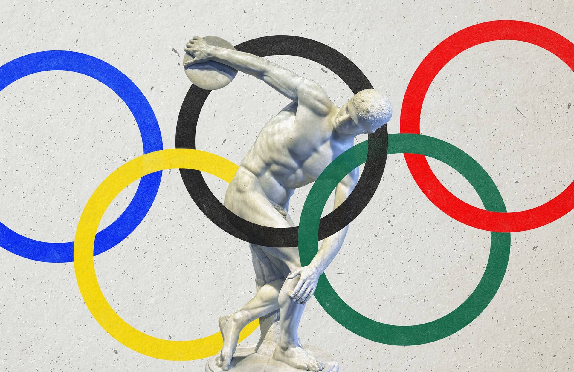 Rysunek pięciu kolorowych kół olimpijskich z figurką dyskobola w środku