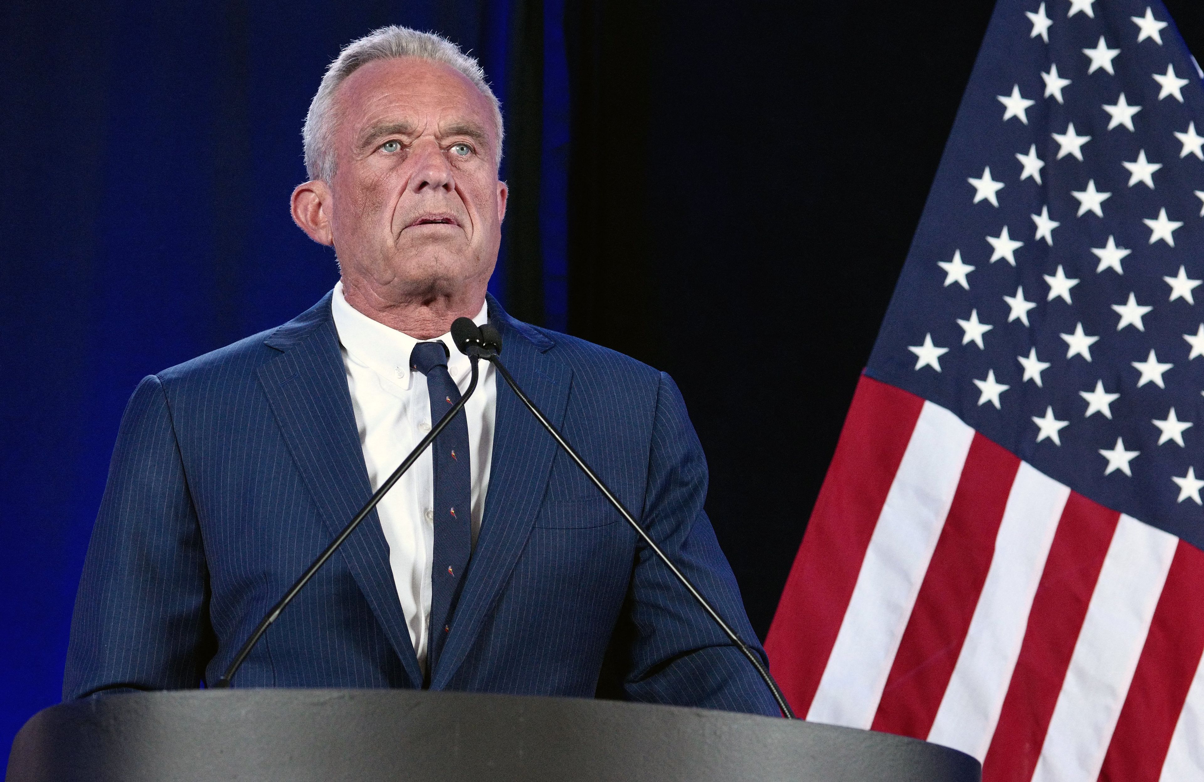 Independent presidential candidate Robert F. Kennedy Jr. speaks in Phoenix, Arizona, August 23, 2024. Robert F. Kennedy Jr, scion of America's storied political clan, suspended his long shot presidential bid on August 23, 2024 and endorsed Donald Trump, injecting a new dose of uncertainty into the White House race. (Photo by Olivier Touron / AFP)