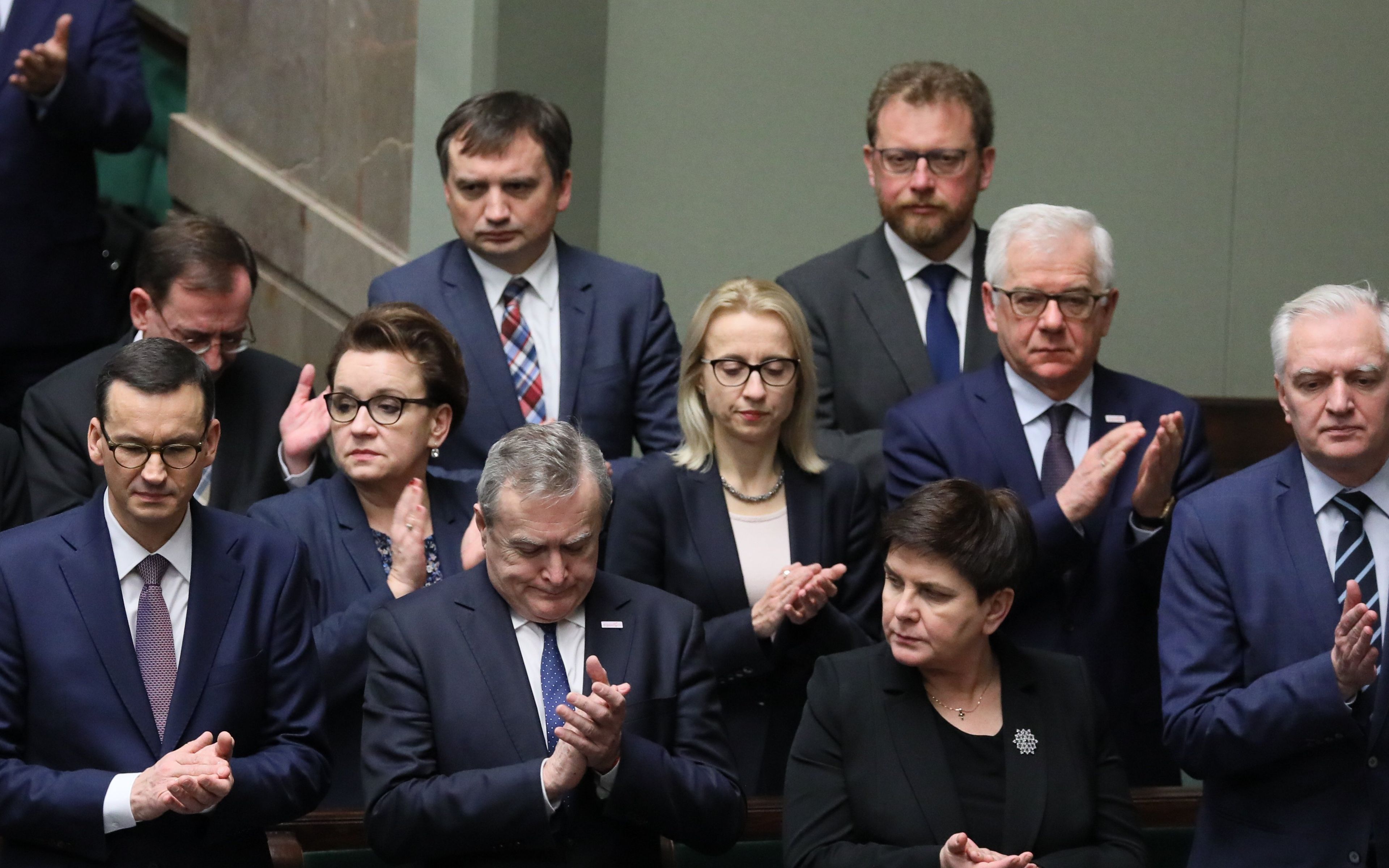 12.12.2018 Warszawa , ulica Wiejska . Sejm . Minister infrastruktury Andrzej Adamczyk  , minister rodziny , pracy i polityki spolecznej Elzbieta Rafalska , minister kordynator sluzb specjalnych Mariusz Kaminski , minister sprawiedliwosci Zbigniew Ziobro , minister zdrowia Lukasz Szumowski , minister edukacji narodowej Anna Zalewska , minister finansow Teresa Czerwinska , minister spraw zagranicznych Jacek Czaputowicz , premier Mateusz Morawiecki , minister kultury i dziedzictwa narodowego Piotr Glinski , wicepremier Beata Szydlo , minister nauki i szkolnictwa wyzszego Jaroslaw Gowin podczas przyjecia przez aklamacje projektu uchwaly w sprawie upamietnienia dwusetnej rocznicy urodzin Ernesta Malinowskiego . 
Fot. Slawomir Kaminski / Agencja Gazeta
