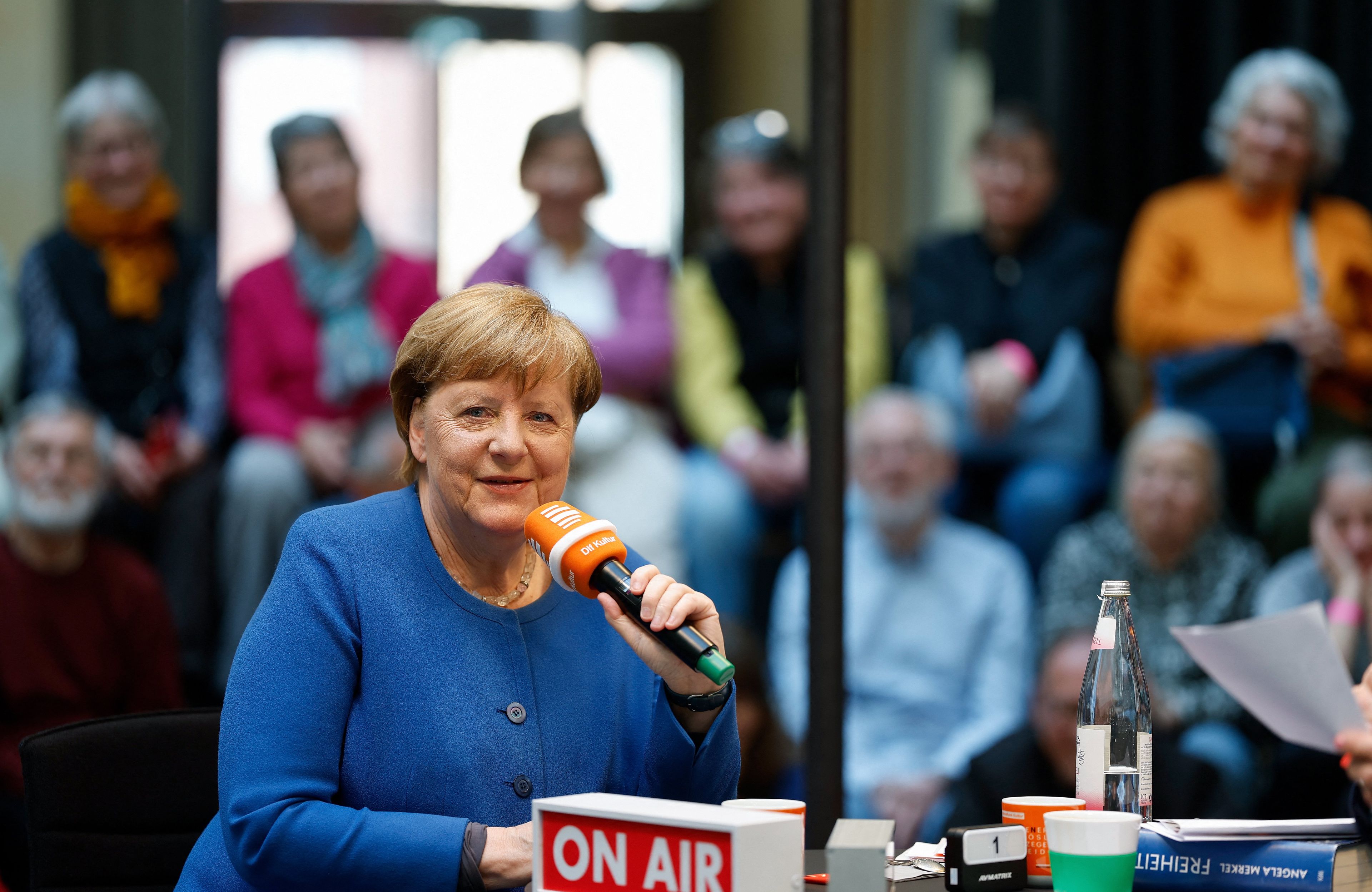 Former chancellor Angela Merkel answer questions on a radio show