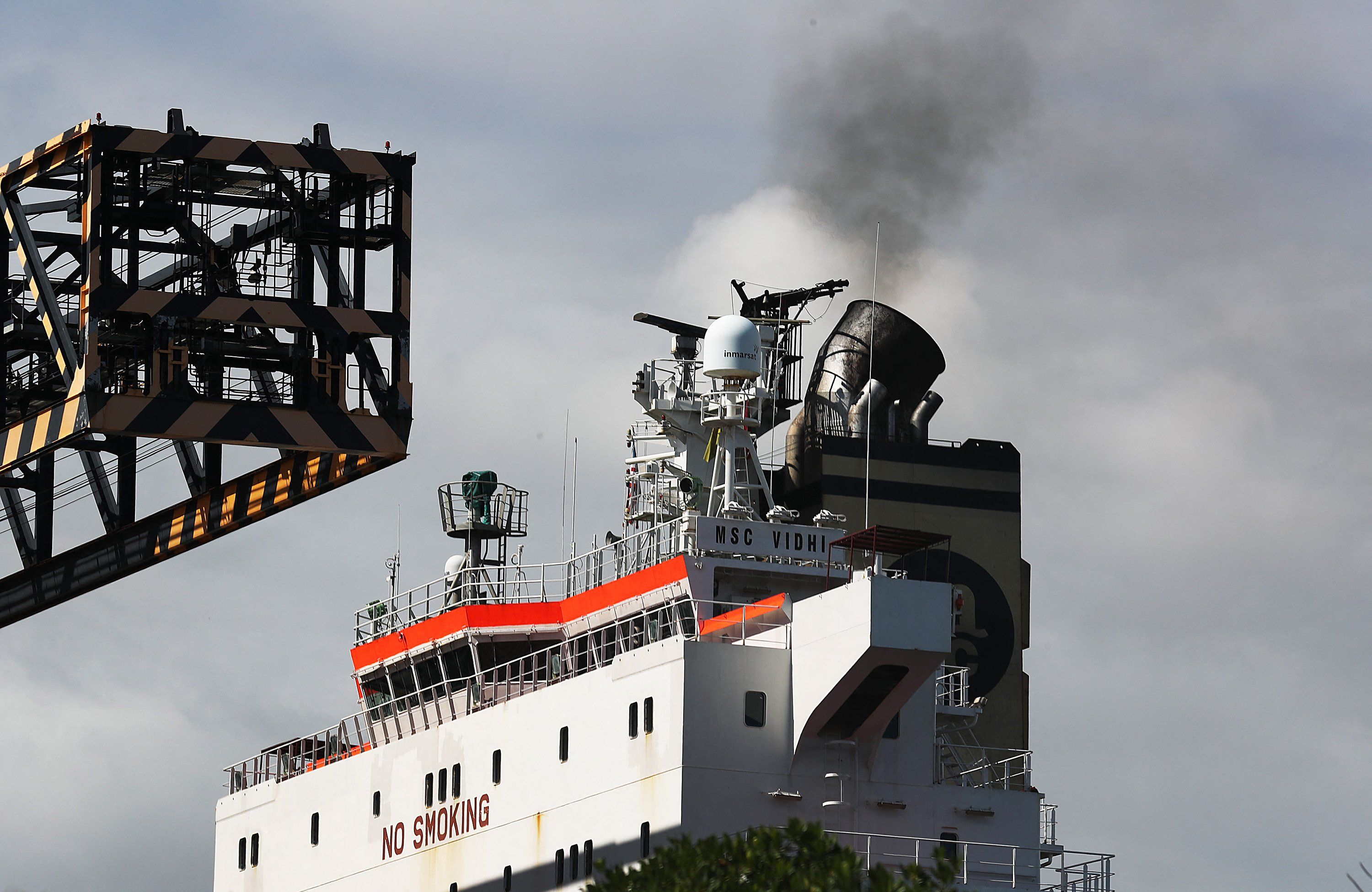 FORT LAUDERDALE, FLORIDA - NOVEMBER 05: Smoke is seen pouring from the smoke stack on a container ship at Port Everglades on November 05, 2019 in Fort Lauderdale, Florida. As the Trump administration officially withdraws from the Pairs Climate Agreement according to a 2017 EPA study the largest source of greenhouse gas emissions in the United States is from the transportation sector which primarily come from burning fossil fuel for cars, trucks, ships, trains, and planes.   Joe Raedle/Getty Images/AFP (Photo by JOE RAEDLE / GETTY IMAGES NORTH AMERICA / Getty Images via AFP)