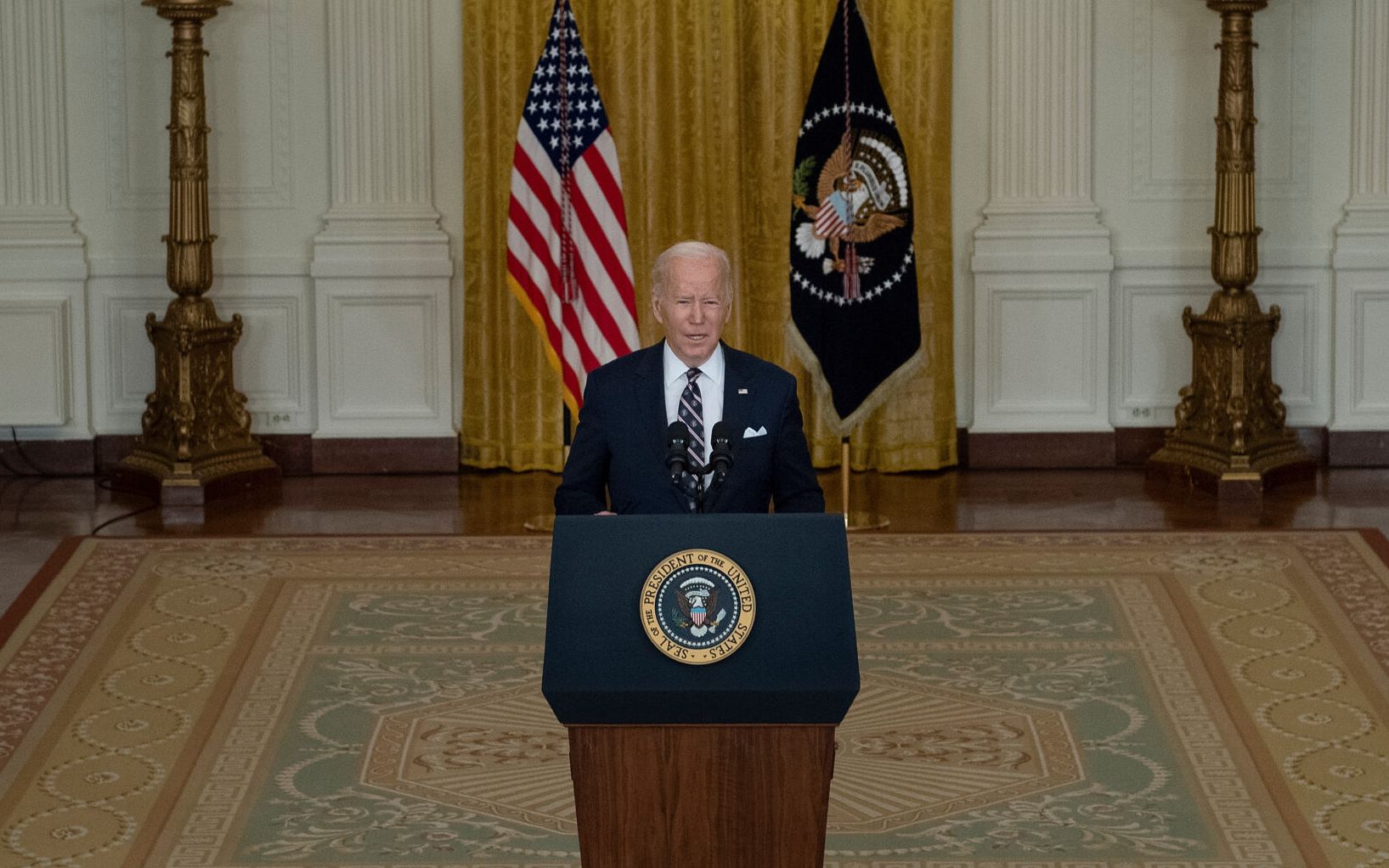 US President Joe Biden speaks in the East Room of the White House about Russian military activity near Ukraine February 22, 2022, in Washington, DC. - Biden said Tuesday that Russia has begun to invade Ukraine and plans to go much further than he had previously indicated. "This is the beginning of a Russian invasion of Ukraine," the US leader said, referring to Russian President Vladimir Putin's stated plans to send troops deep into the Donbas region. (Photo by Brendan Smialowski / AFP)