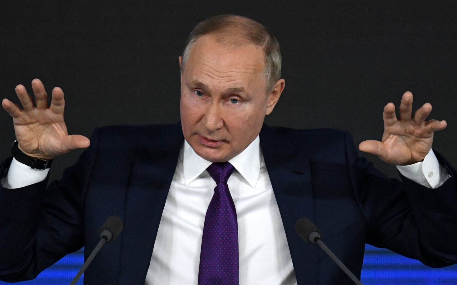 Russian President Vladimir Putin holds his annual press conference at the Manezh exhibition hall in central Moscow on December 23, 2021. (Photo by Natalia KOLESNIKOVA / AFP)