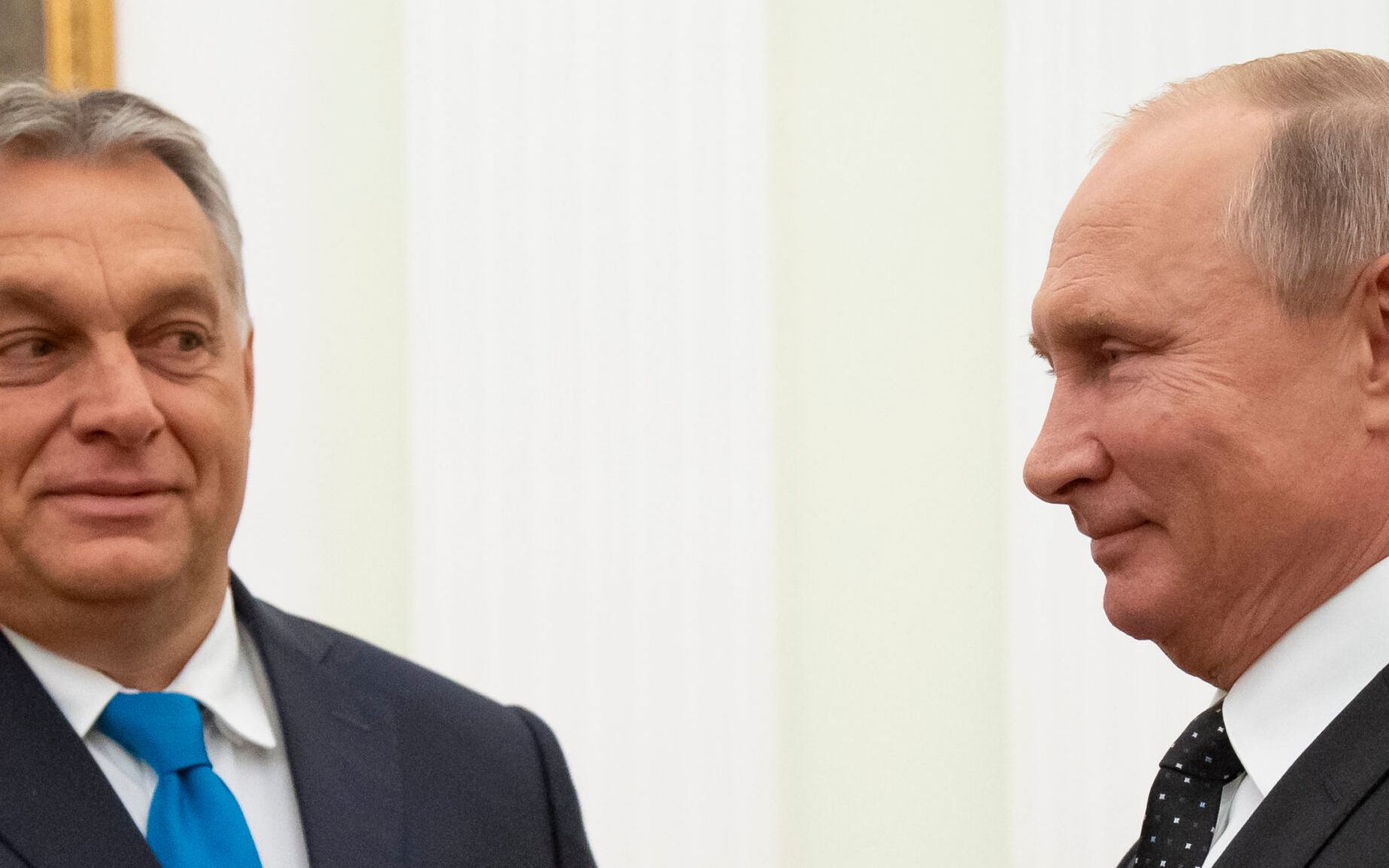 Hungarian Prime Minister Viktor Orban (L) speaks with Russian President Vladimir Putin during their meeting in the Kremlin in Moscow, on September 18, 2018. (Photo by Alexander Zemlianichenko / POOL / AFP)
