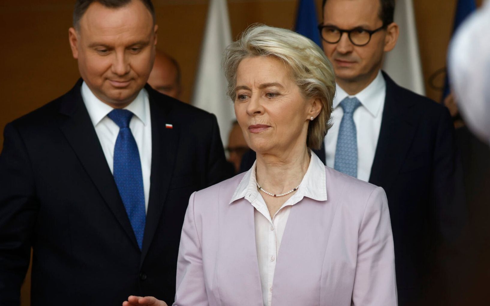 European Commission President Ursula von der Leyen, Polish President Andrzej Duda (2L) and Polish Prime Minister Mateusz Morawiecki arrive to address a joint press conference at the PSE Polish Power Systems headquarters in Konstancin-Jeziorna near Warsaw on June 2, 2022. (Photo by Wojtek Radwanski / AFP)