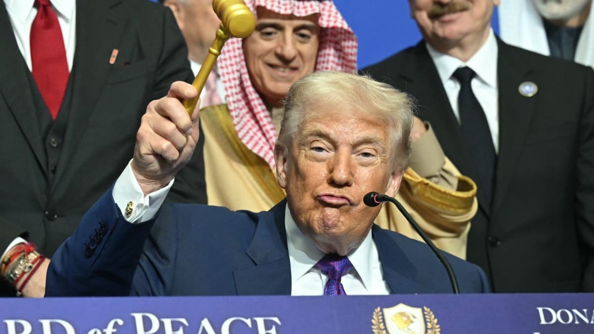 US President Donald Trump holds a gavel during a signing ceremony at the inaugural meeting of the "Board of Peace" at the US Institute of Peace in Washington, DC, on February 19, 2026. President Trump on Thursday gathers allies to inaugurate the "Board of Peace," his new institution focused on progress on Gaza but whose ambitions reach much further. Around two dozen world leaders or other senior officials have come to Washington for the meeting -- including several of Trump's authoritarian-leaning friends and virtually none of the European democrats that traditionally sign on to US initiatives. (Photo by SAUL LOEB / AFP)