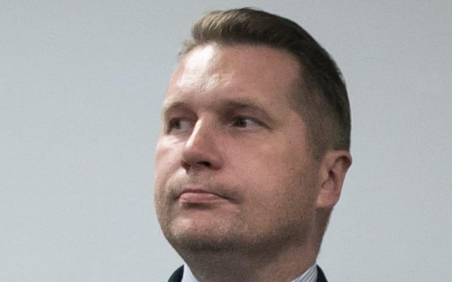 13.10.2019 Lublin . Od lewej : wojewoda lubelski Przemyslaw Czarnek , Krzysztof Michalkiewicz , Sylwester Tulajew w sztabie wyborczym PiS po ogloszeniu wstepnych wynikow wyborow parlamentarnych .
Fot. Jakub Orzechowski / Agencja Gazeta