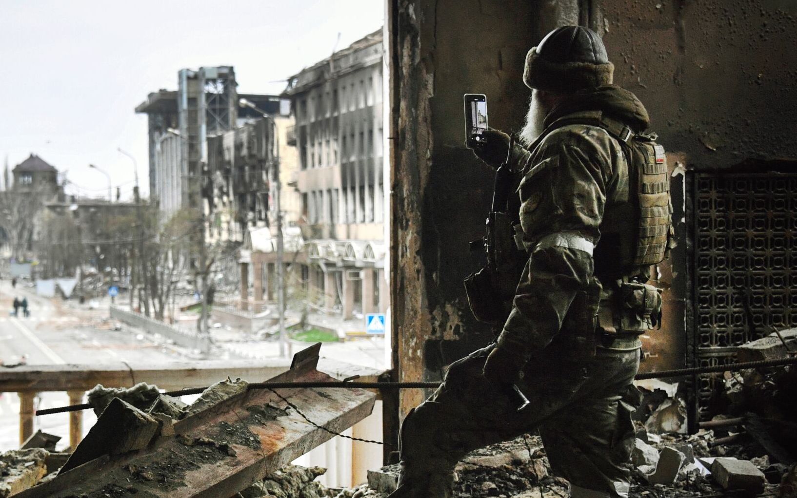 UKRAINE - RUSSIA CONFLICT 100 DAYS 100 PICTURES
AFP presents a selection of 100 pictures to mark 100 days of Russia's war in Ukraine

A Russian soldier patrols at the Mariupol drama theatre, bombed last March 16, on April 12, 2022 in Mariupol, as Russian troops intensify a campaign to take the strategic port city, part of an anticipated massive onslaught across eastern Ukraine, while Russia's President makes a defiant case for the war on Russia's neighbour. - *EDITOR'S NOTE: This picture was taken during a trip organized by the Russian military.* (Photo by Alexander NEMENOV / AFP) / NO USE AFTER JUNE 30, 2022 22:00:00 GMT - UKRAINE - RUSSIA CONFLICT 100 DAYS 100 PICTURES
 - UKRAINE - RUSSIA CONFLICT 100 DAYS 100 PICTURES