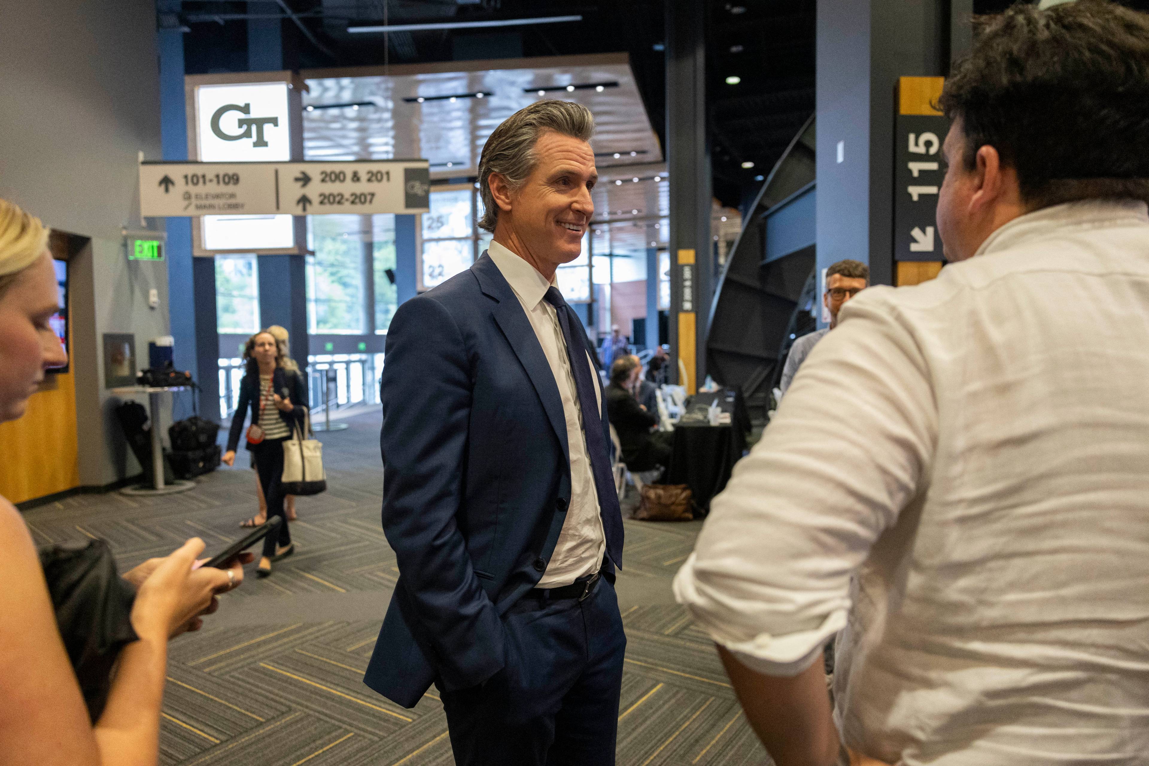 California Governor Gavin Newsom speaks to the media in the McCamish Pavilion at the Georgia Institute of Technology campus ahead of the first presidential debate in Atlanta, Georgia, on June 27, 2024. (Photo by CHRISTIAN MONTERROSA / AFP)