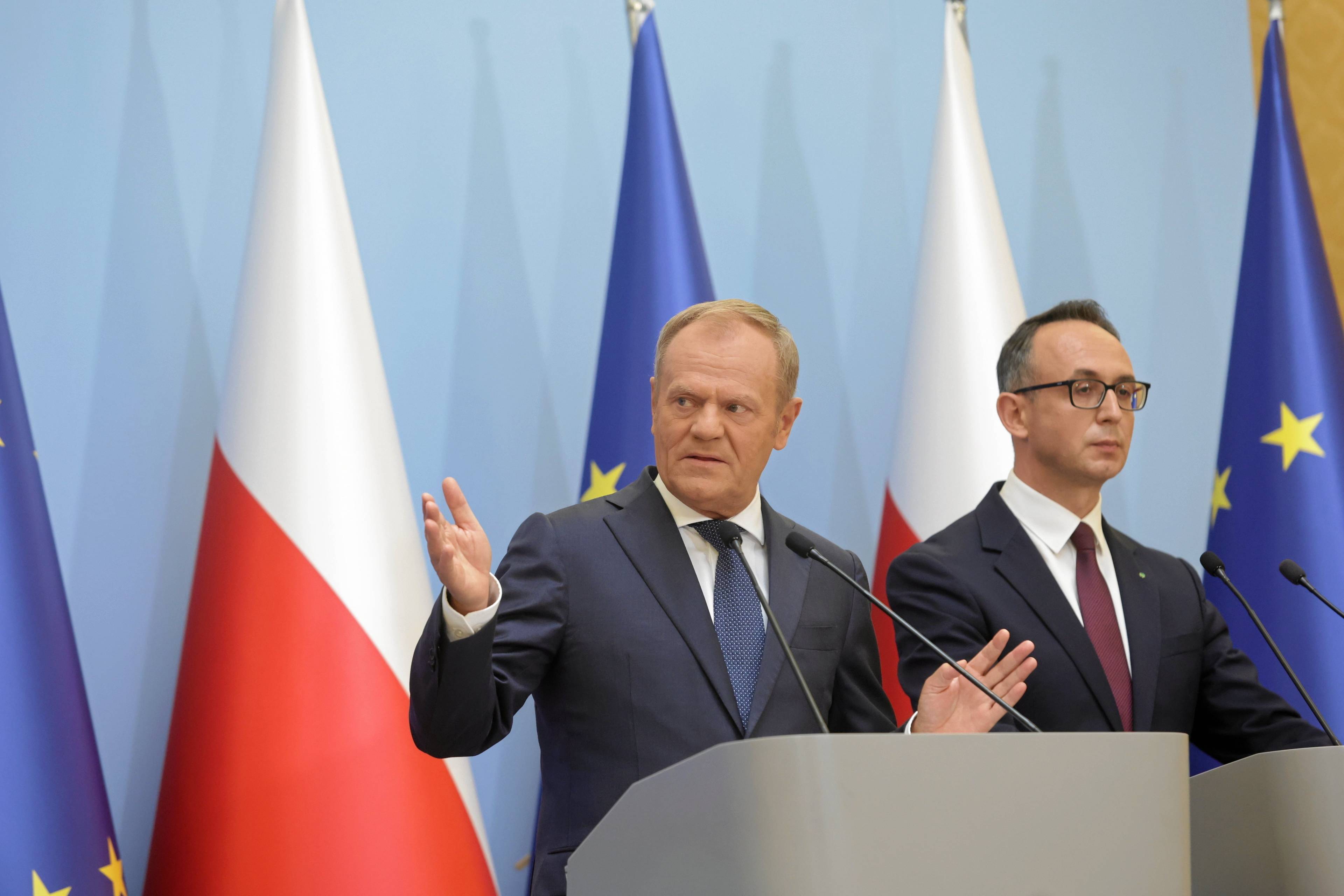 premier Donald Tusk i minister infrastruktury Dariusz Klimczak