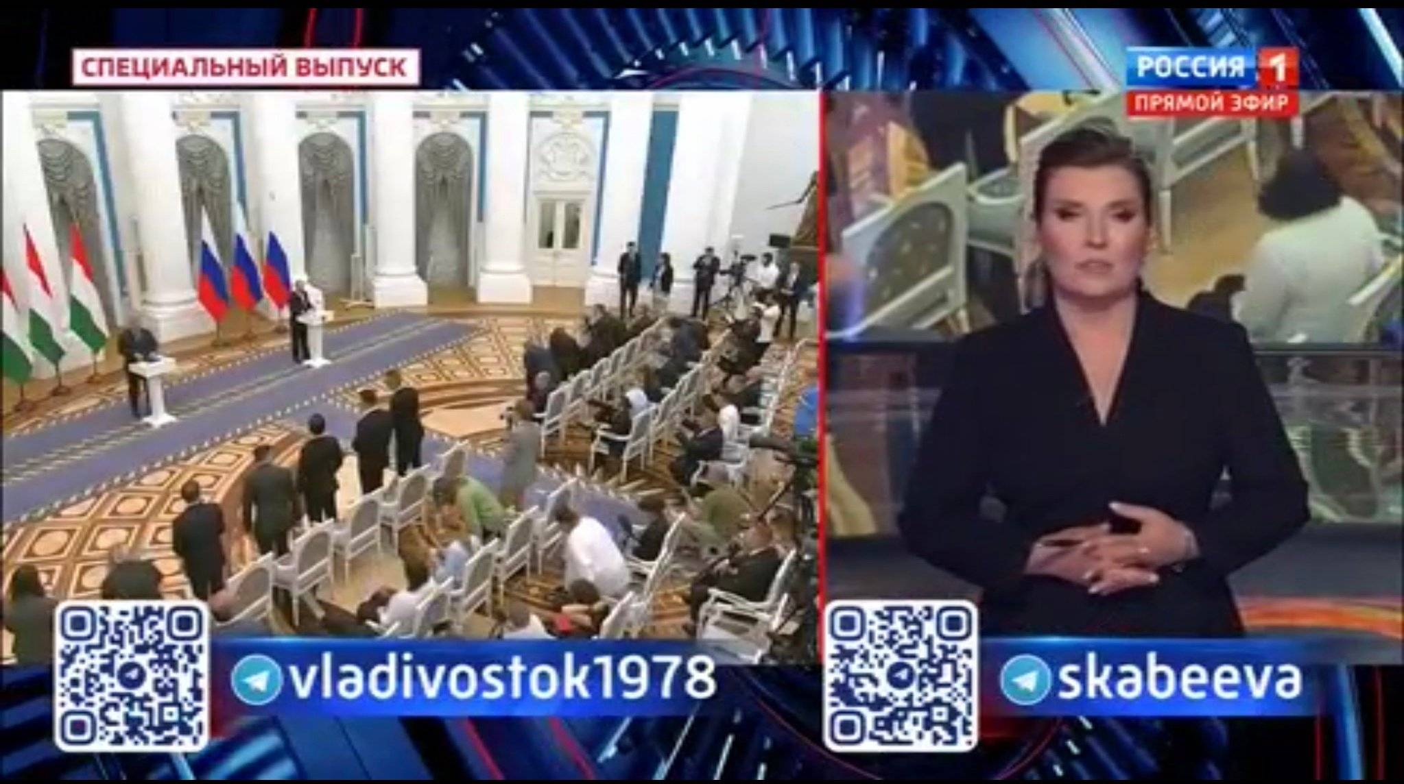 Studio telewizyjne. Prezenterka (Olga Skabajewa)., a na ekranie - Putin i Orban