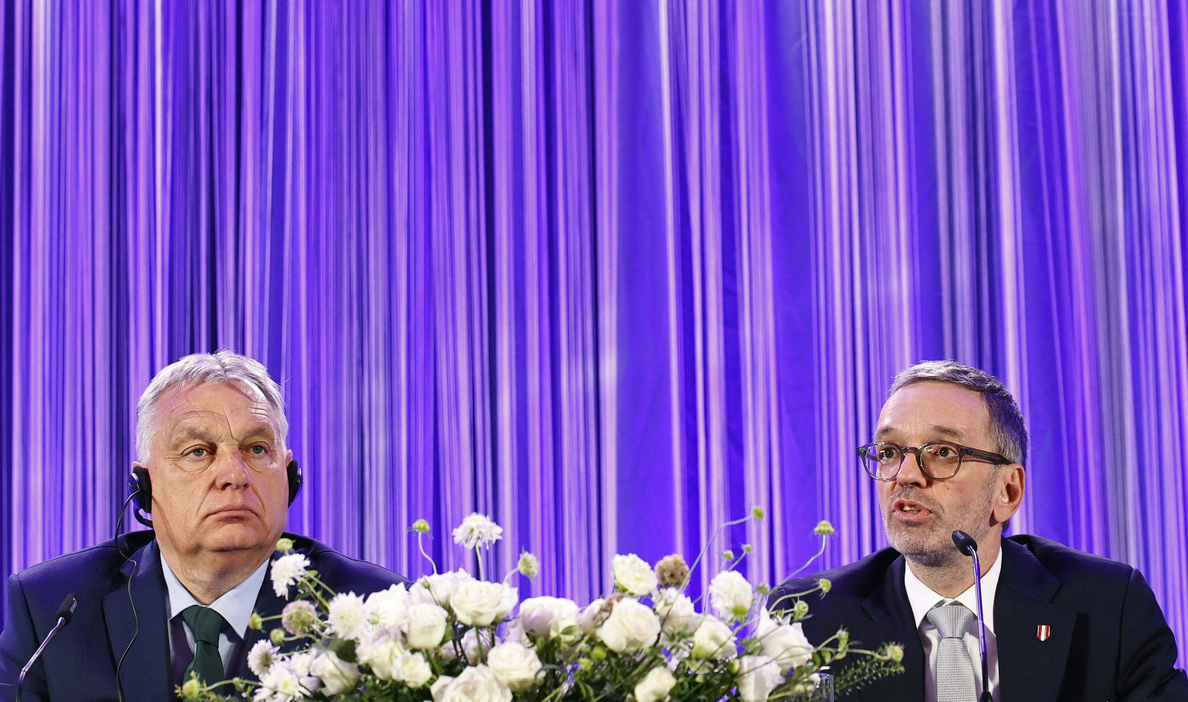 Hungary's Prime Minister Viktor Orban (L) attends a meeting with Chairman of the right-wing Freedom Party Austria (FPOe) Herbert Kickl for a joint statement, in Wien, on June 30, 2024. (Photo by TOBIAS STEINMAURER / APA / AFP) / Austria OUT