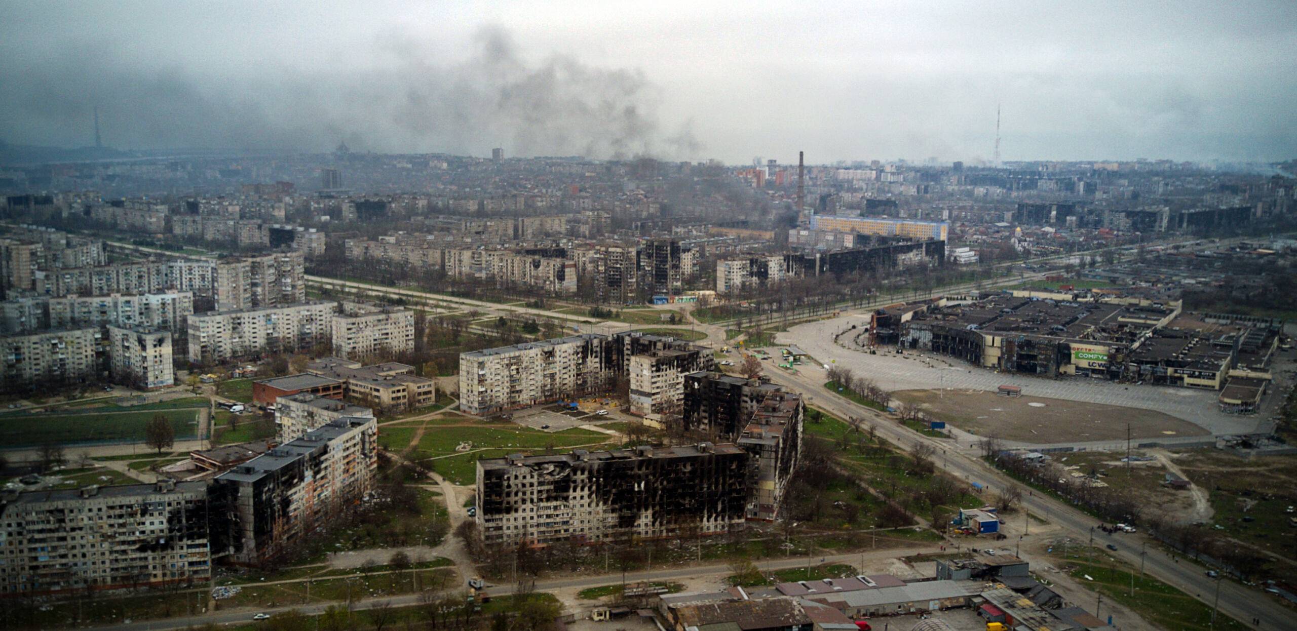 An aerial view taken on April 12, 2022, shows the city of Mariupol, during Russia's military invasion launched on Ukraine. - Russian troops on April 12 intensified their campaign to take the port city of Mariupol, part of an anticipated massive onslaught across eastern Ukraine, as the Russian president made a defiant case for the war on Russia's neighbour. (Photo by Andrey BORODULIN / AFP)
