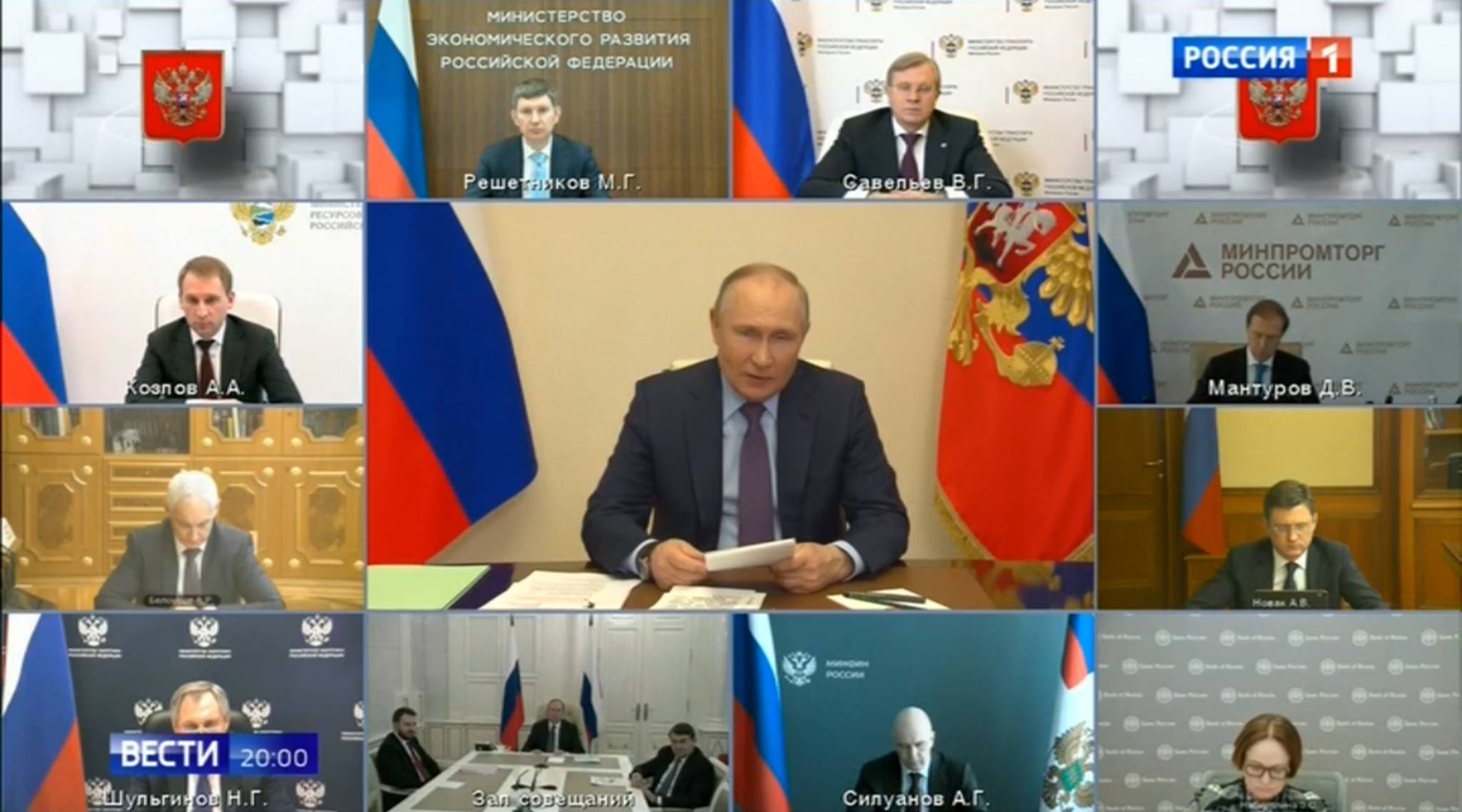 Telekonferencja na ekranie komputera. W środku Putin, wokół urzędnicy