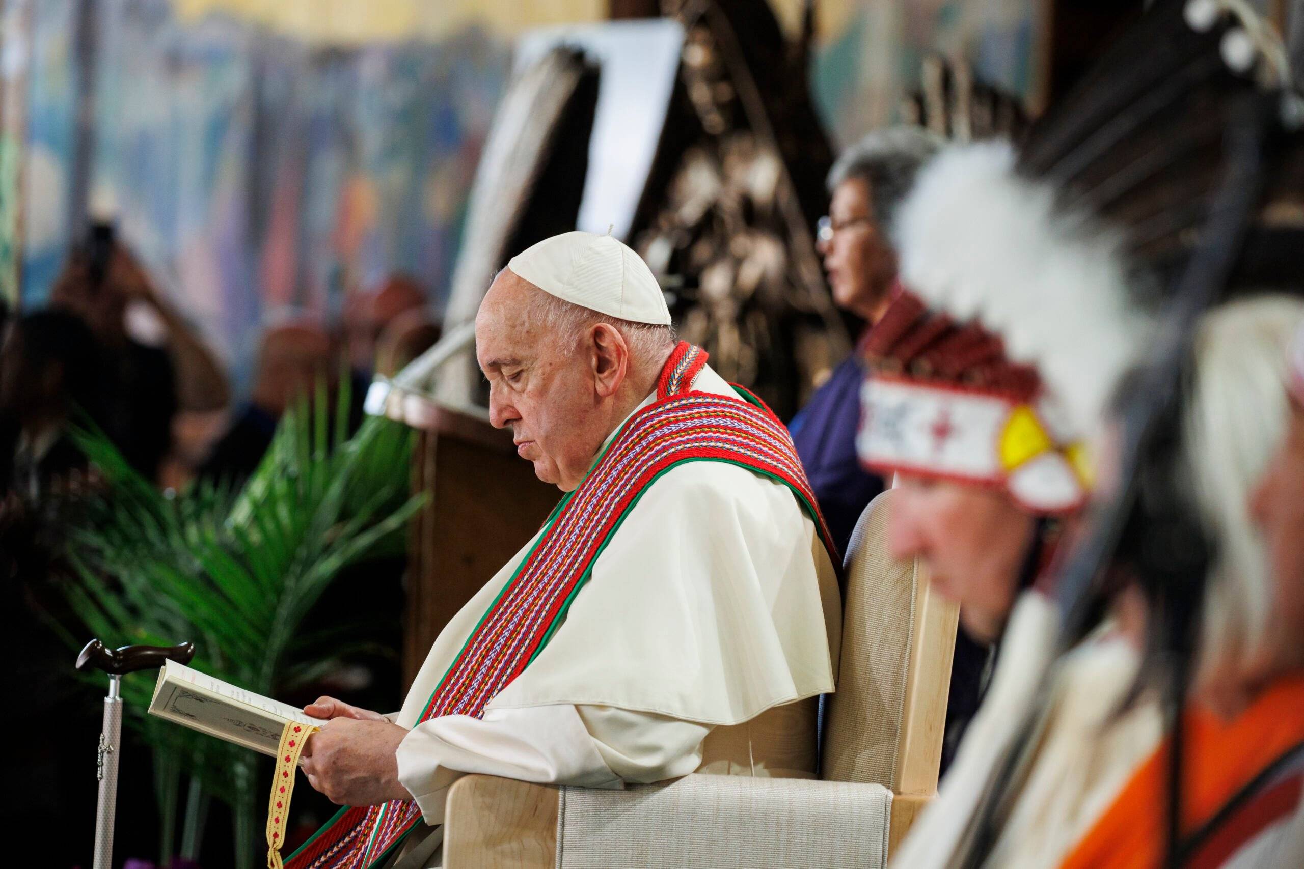 LAC STE. ANNE, AB - JULY 26: Pope Francis reads along at the Ste. Anne Shrine after making the pilgrimage to the lake on July 26, 2022 in Lac Ste. Anne, Canada. The pope is meeting with Indigenous communities and community leaders in Canada in an effort to reconcile the history of physical and sexual abuse of Indigenous children in the country's Catholic-run residential schools, as detailed in a 2015 Canadian-government-funded commission report.   Cole Burston/Getty Images/AFP (Photo by Cole Burston / GETTY IMAGES NORTH AMERICA / Getty Images via AFP)