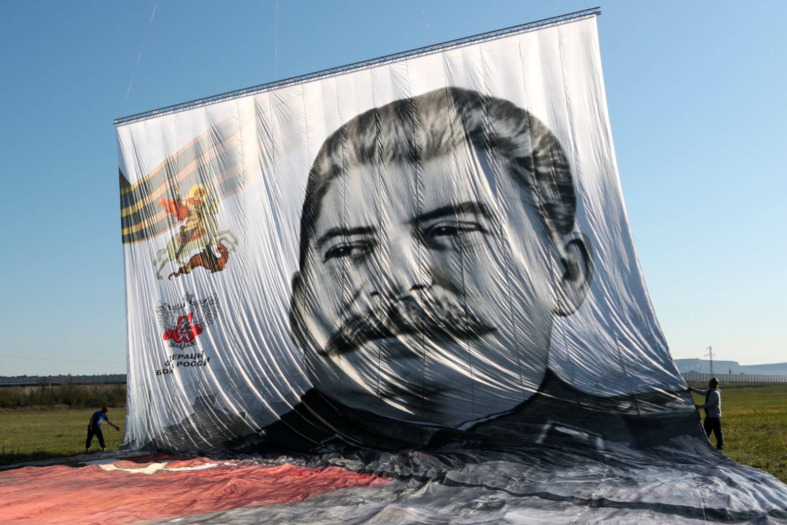 Russian Boxing Federation lifts a portrait of late Soviet leader Joseph Stalin with a hot air balloon, close to city of Belogorsk outside Simferopol, Crimea, on May 11, 2020, to mark the 75th anniversary of the end of World War II also called the Great Patriotic War, amid the coronavirus (COVID) pandemic. (Photo by - / AFP)
