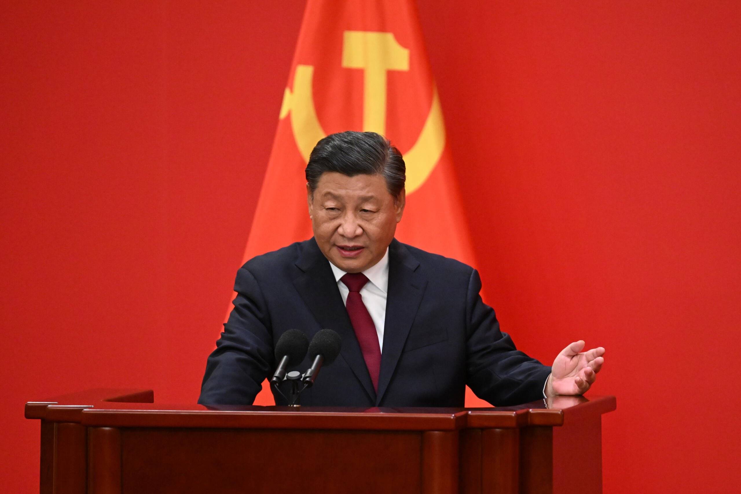 China's President Xi Jinping speaks during an introduction of members of the Chinese Communist Party's new Politburo Standing Committee, the nation's top decision-making body, to the media in the Great Hall of the People in Beijing on October 23, 2022. (Photo by Noel CELIS / AFP)