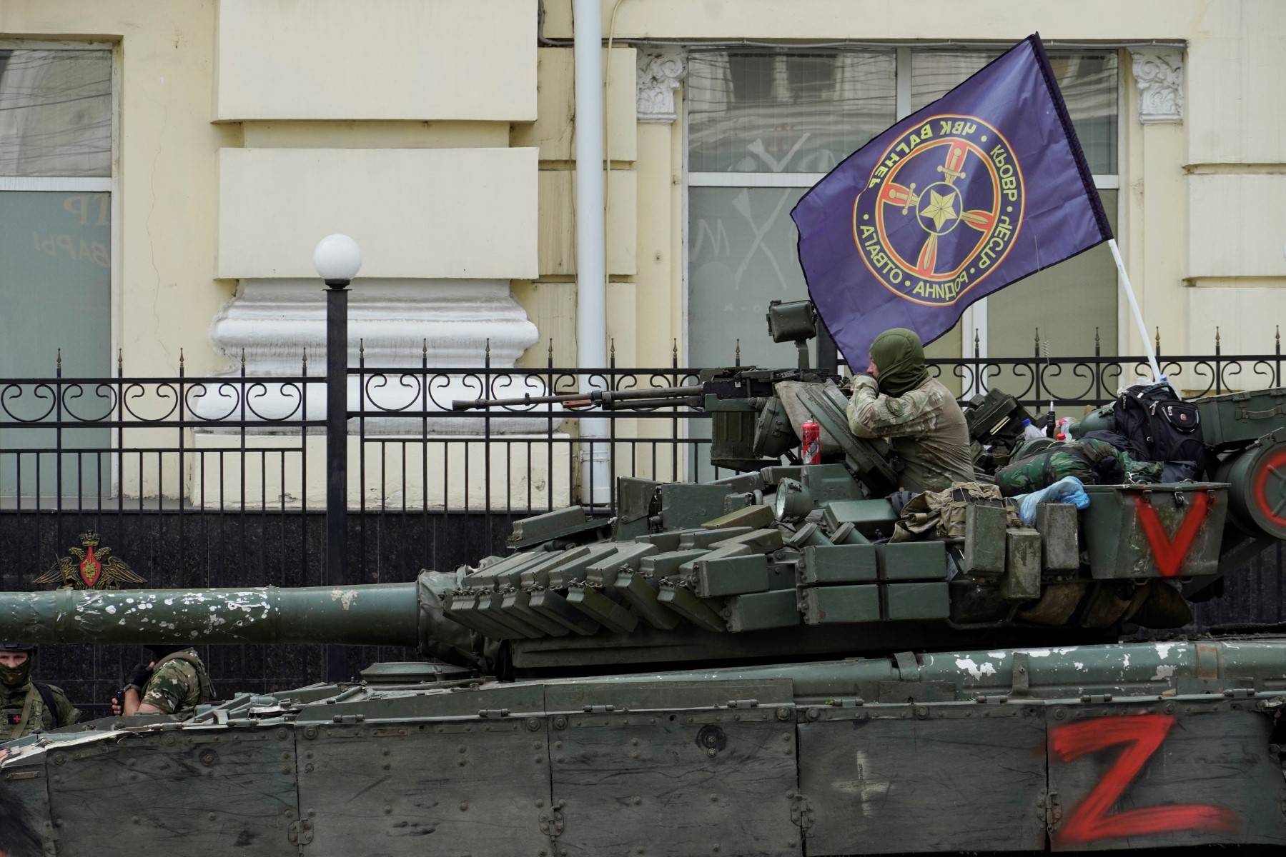 Members of Wagner group sit atop of a tank in a street in the city of Rostov-on-Don, on June 24, 2023. - President Vladimir Putin on June 24, 2023 said an armed mutiny by Wagner mercenaries was a "stab in the back" and that the group's chief Yevgeny Prigozhin had betrayed Russia, as he vowed to punish the dissidents. Prigozhin said his fighters control key military sites in the southern city of Rostov-on-Don. (Photo by STRINGER / AFP)