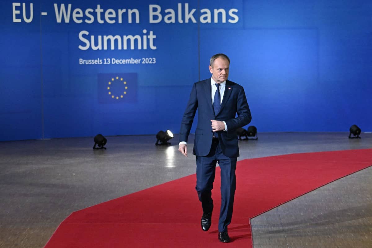 Prime Minister of Poland, Donald Tusk arrives to attend the EU-Western Balkans summit at the European headquarters in Brussels, on December 13, 2023. - EU chief Ursula von der Leyen on December 13, 2023 urged the bloc's 27 leaders to back massive financial aid for Ukraine and Kyiv's ambitions for membership talks, ahead of a crunch summit. (Photo by Miguel MEDINA / AFP)