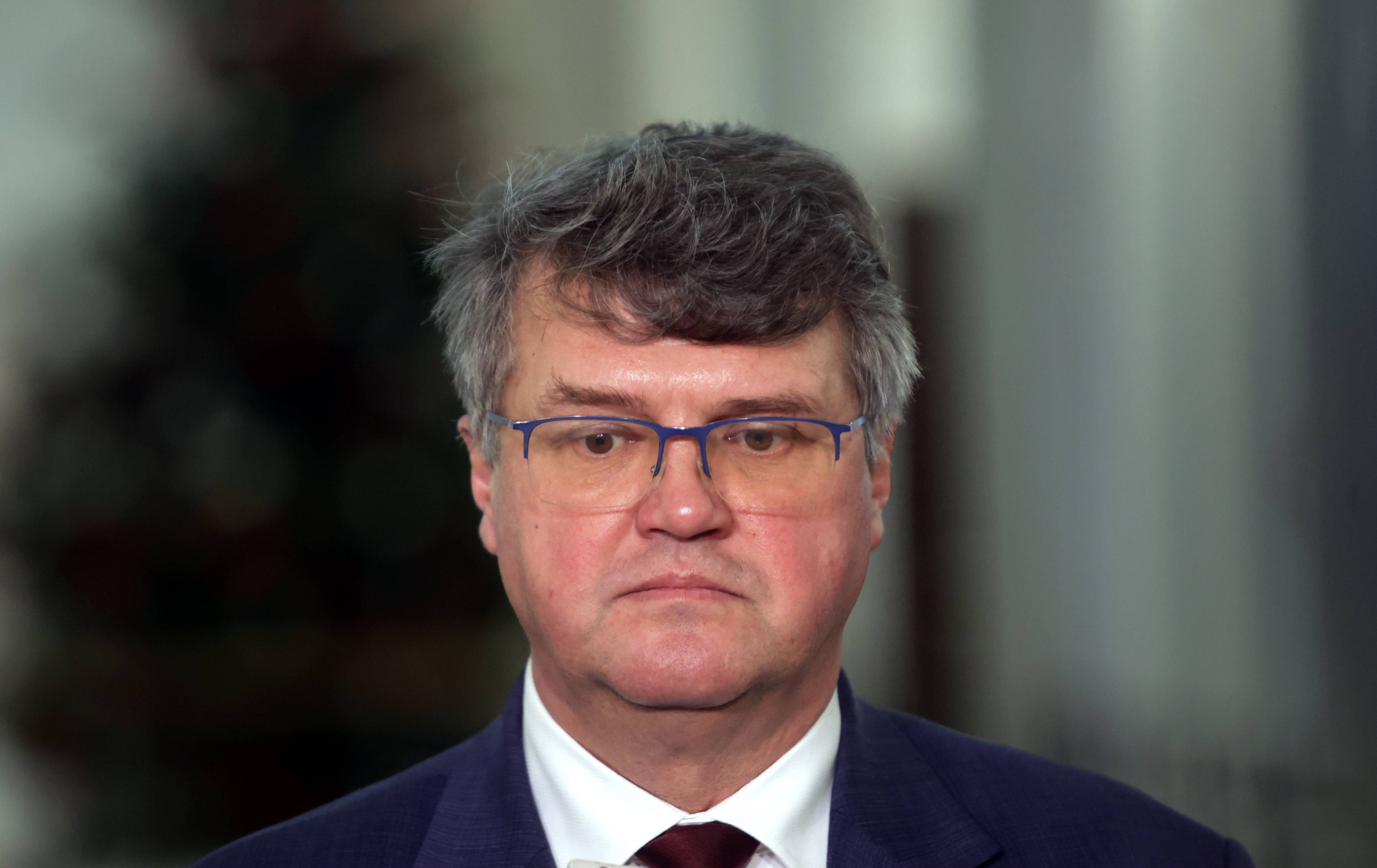 Maciej Wąsik, siwiejący mężczyzna w okularach