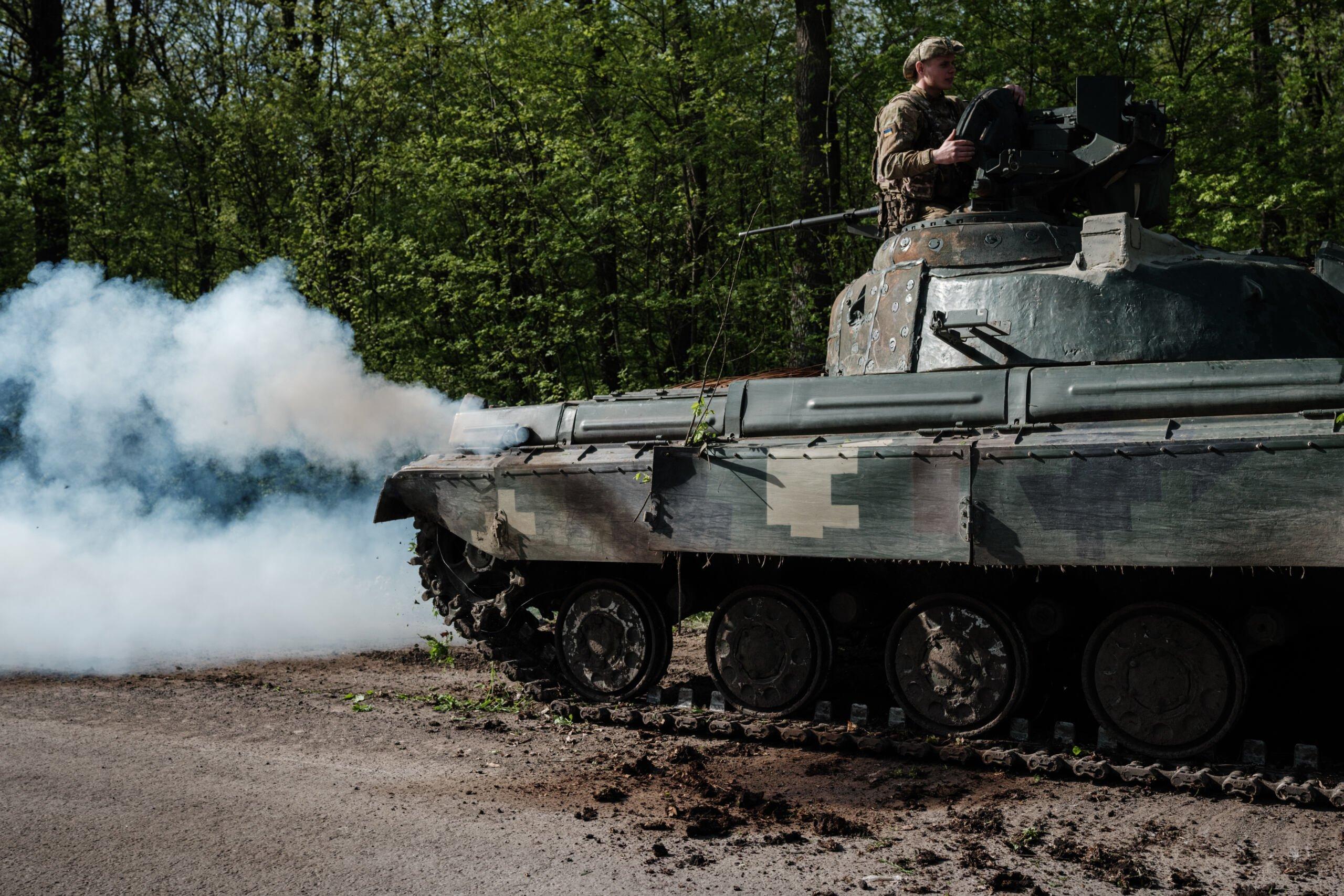 A Ukrainian soldier sits on a tank near Sloviansk, eastern Ukraine, on April 26, 2022, amid the Russian invasion of Ukraine. (Photo by Yasuyoshi CHIBA / AFP)
